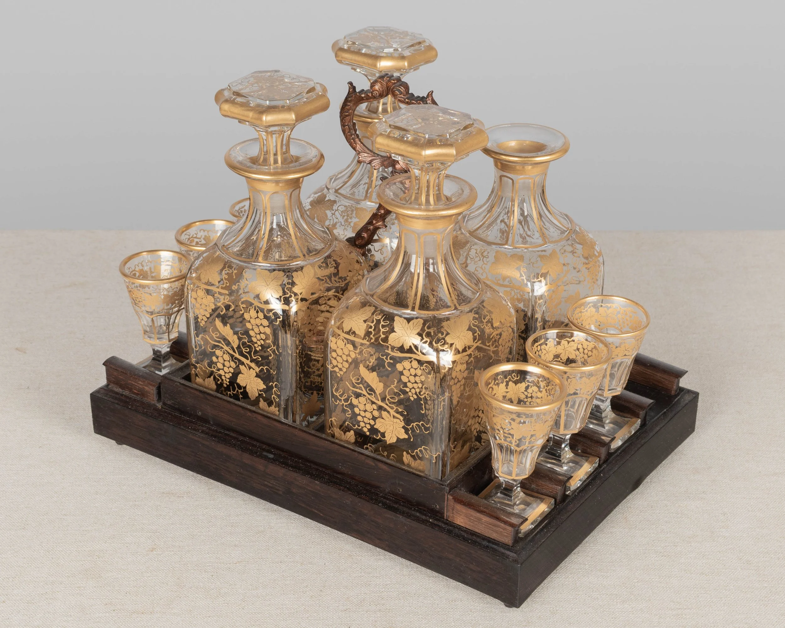 A fine 19th century French Napoleon III tantalus, or cave à liqueur, in the style of Charles-Guillaume Diehl