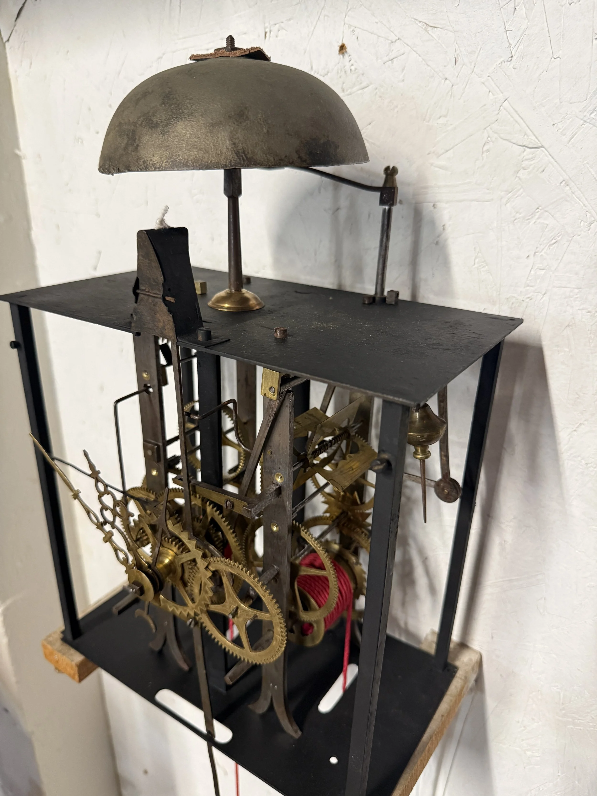 A late 19th century Morbier works for a tall case clock.