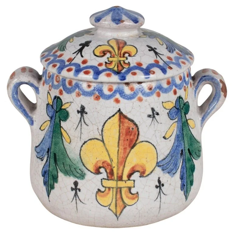 A 19th century French faience small lidded pot for mustard, honey or jam. Hand-painted in beautiful vivid colors of blue, green, yellow and orange on white ground with craquelure glaze
