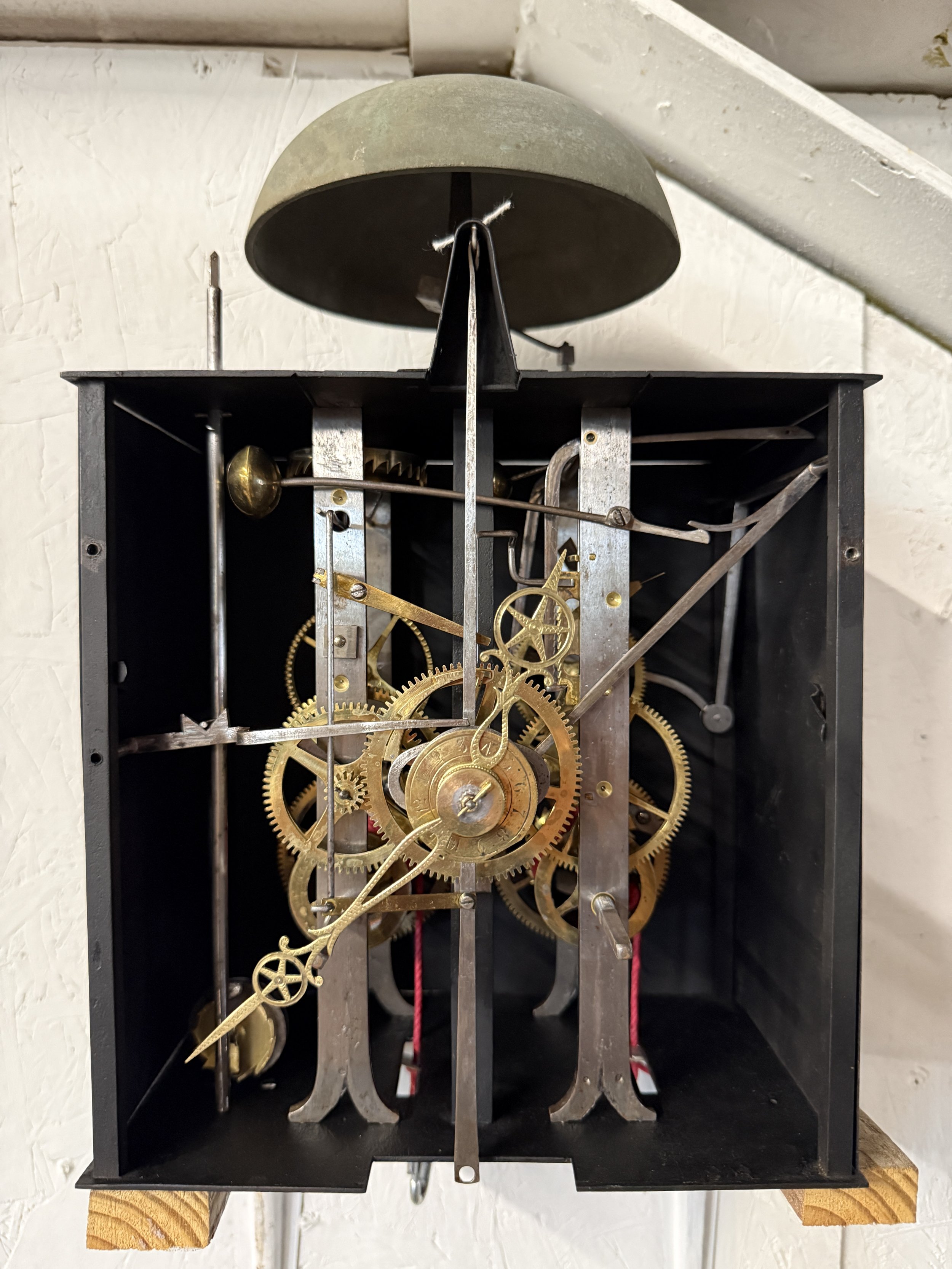 A late 19th century Morbier works for a tall case clock from Jobert Horloger at St Laurent Mâcon with brass embossment of Sun King