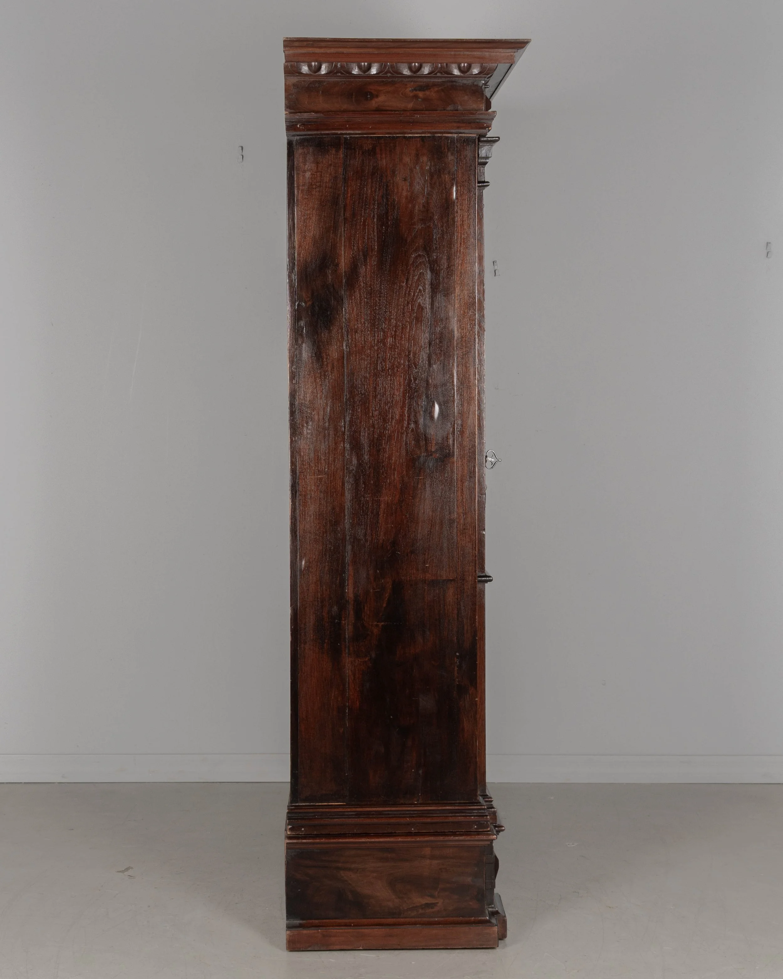 19th Century French Perigord Armoire made of solid walnut and veneers of walnut with pine as a secondary wood.