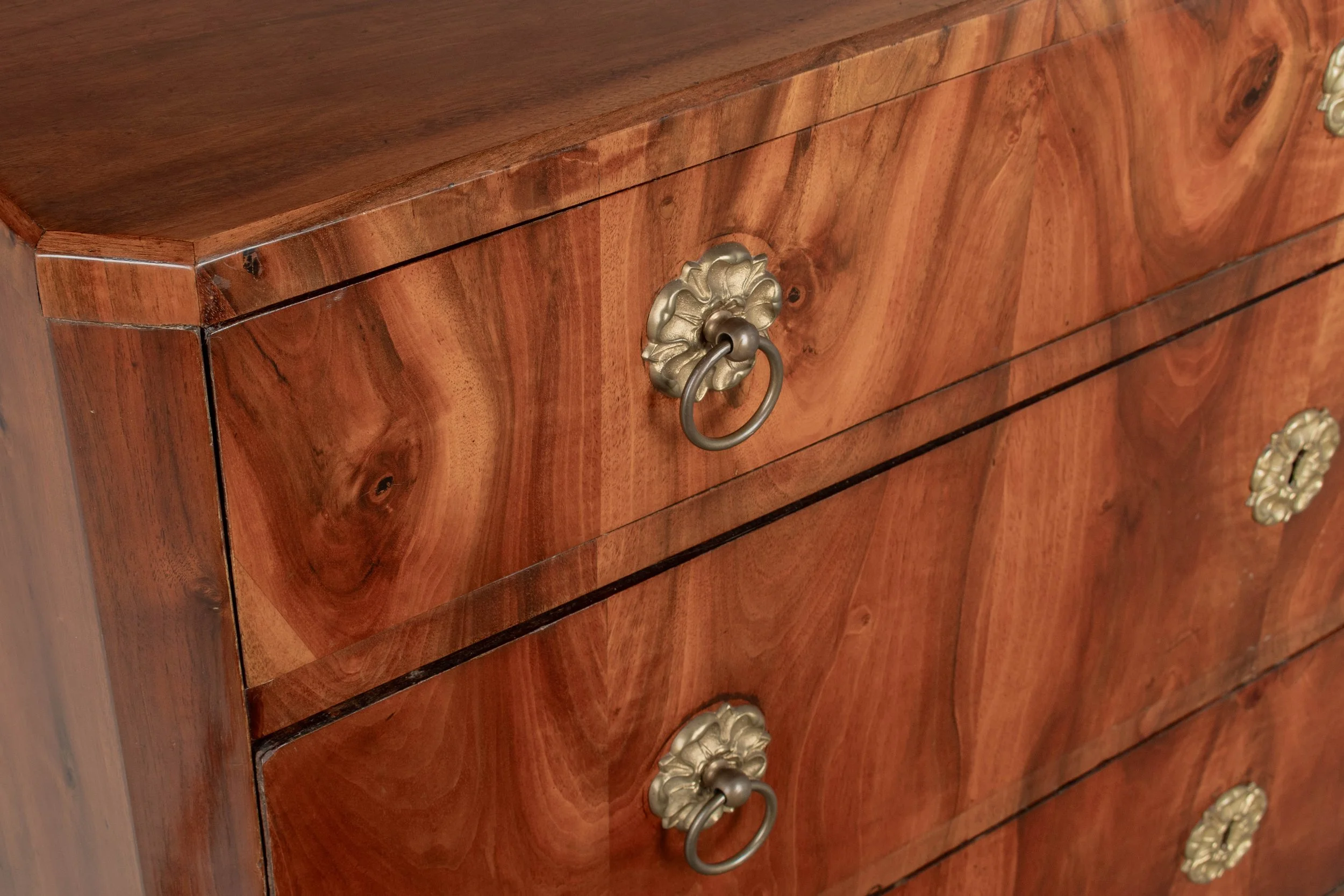 A fine 19th century Biedermeier commode from Austria made with beautifully patterned book matched veneer of walnut over pine.