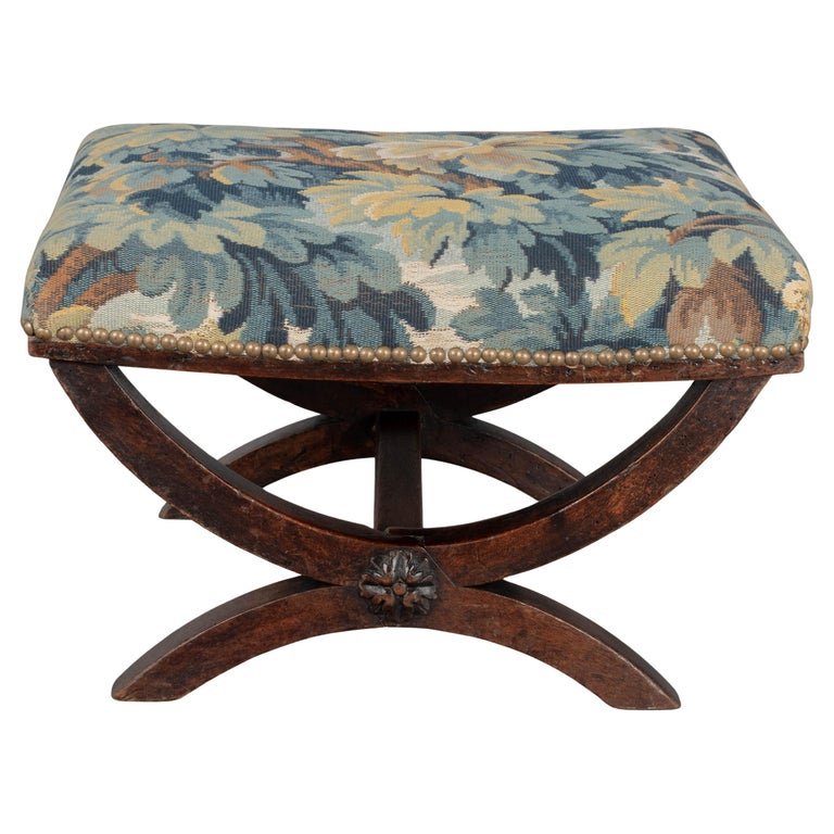 A small 19th century Louis XIII style stool with solid walnut frame and carved medallion detail