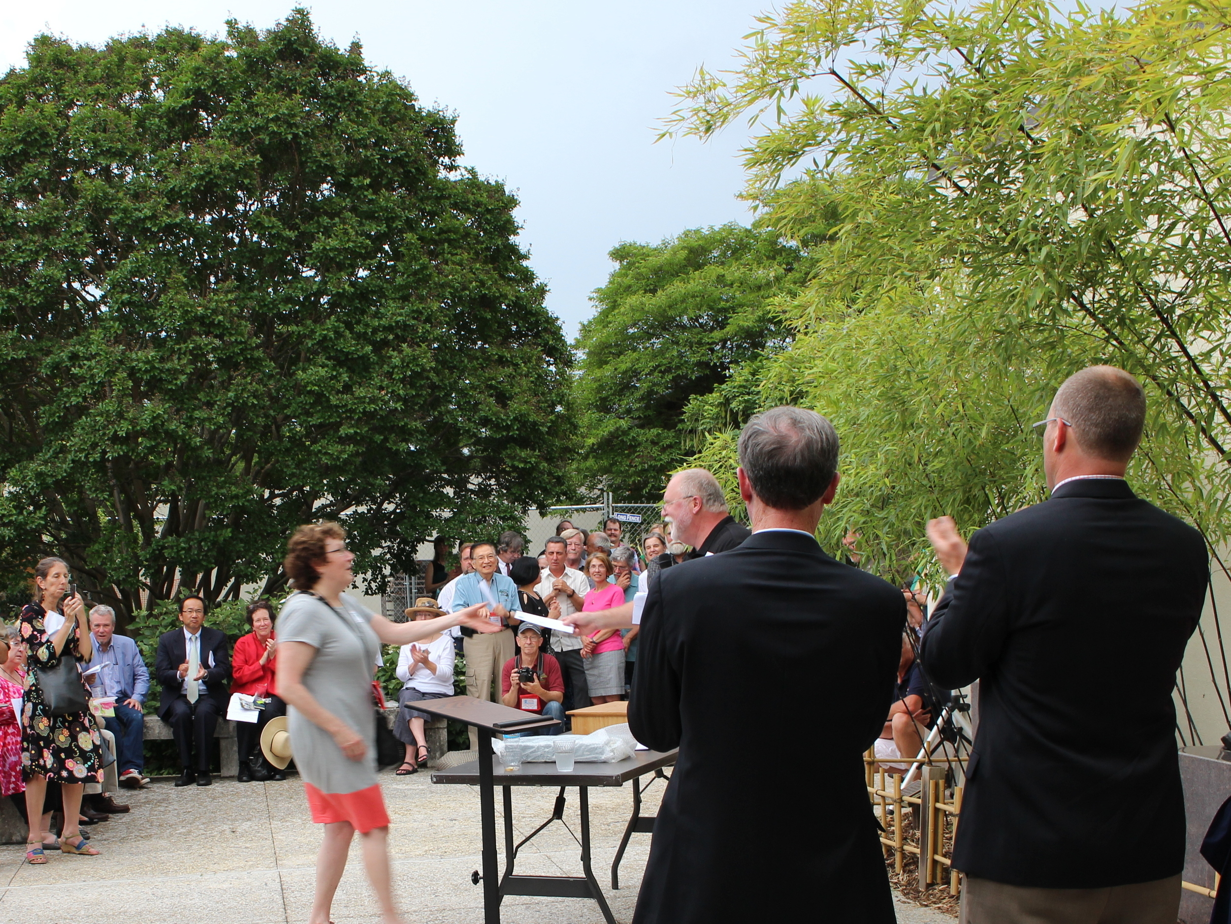 Kit Ruseau receiving the 2nd Place Kusamono Pot award.
