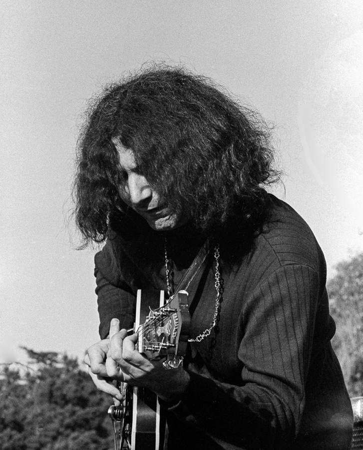  Jerry Garcia in an intense moment while soloing at the Human Be-In 