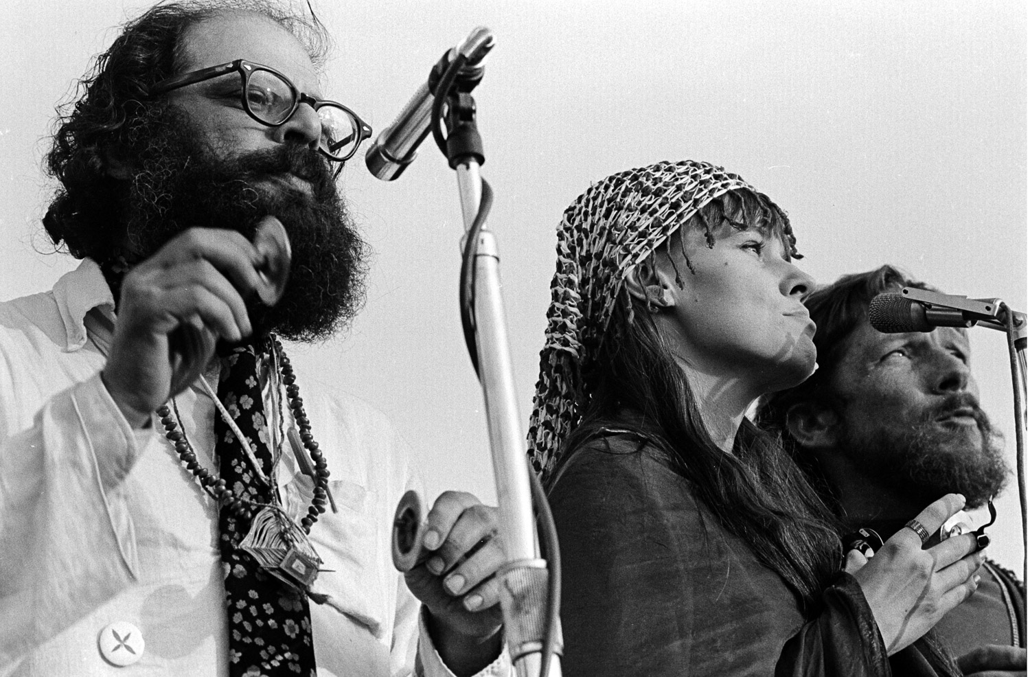 Allen Ginsberg (left), Maretta Greer (center) and Gary Snyder (right) read poetry and chant a mantra to peace at the Human Be-In.