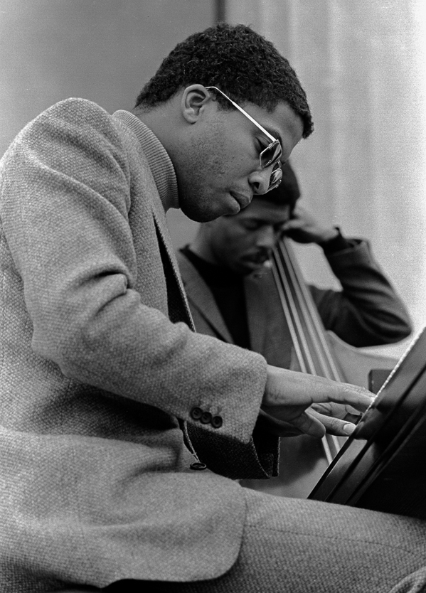  A young  Herbie Hancock  (piano) and  Ron Carter  (bass) hold their own at the Berkeley Jazz Festival in 1968. 