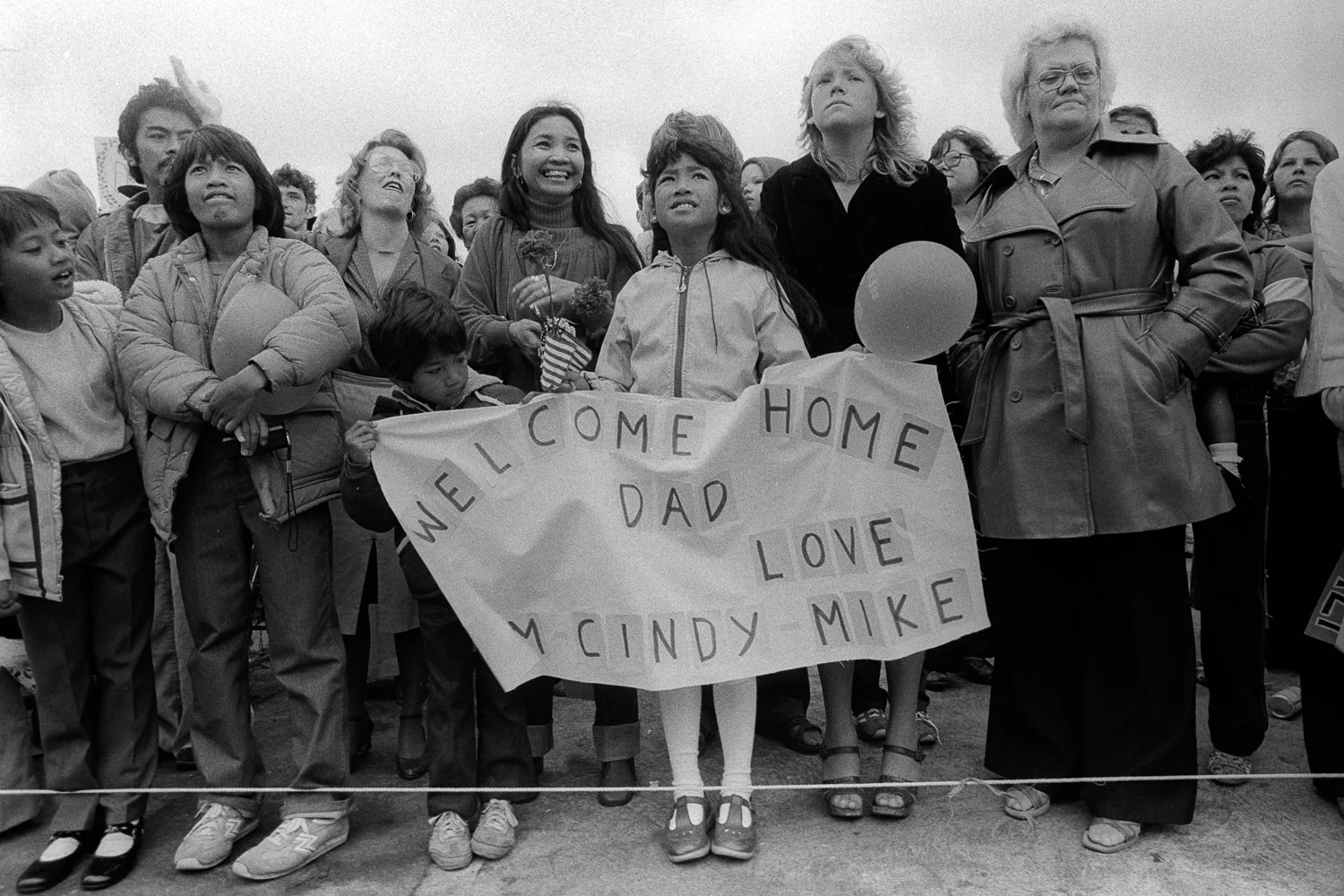 Kids, wives, girlfriends and pals are happy to turn out when the USS Coral Sea returns after a six month deployment.