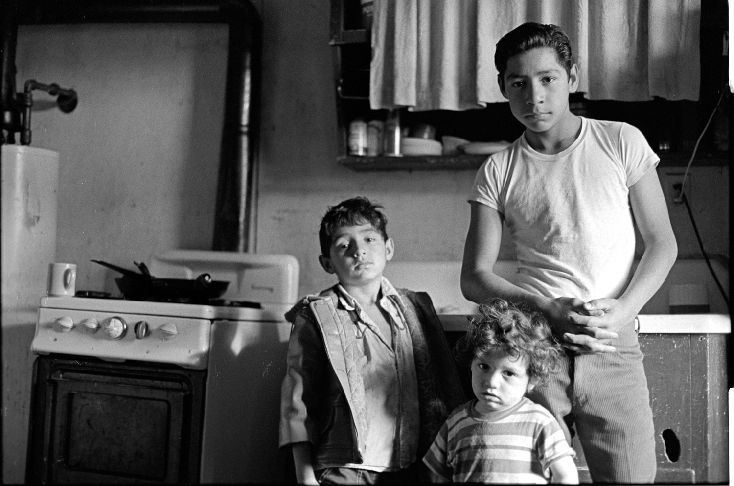 These three boys didn't mind coming into the kitchen for this shot.
