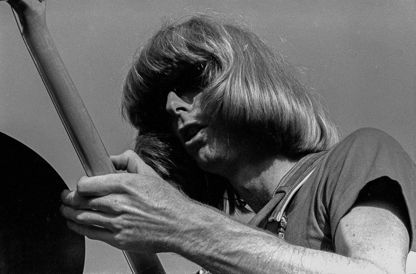 Phil Lesh , playing bass on a rare, sunny day in Golden Gate Park, at the Human Be-In