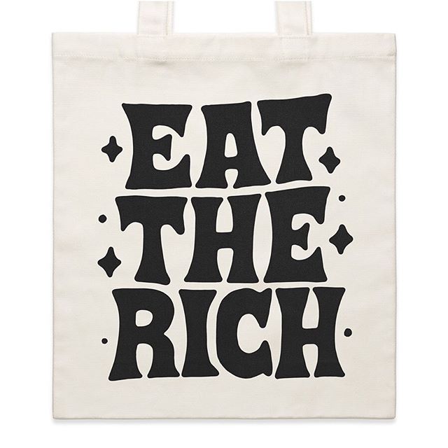 The EAT THE RICH tote-bag.
Whilst this tote won&rsquo;t fix all your problems, it&rsquo;ll at least help keep your shit together. Made from tough cotton-canvas, it won&rsquo;t let you down.
42 x 42cm. About the right size to carry a human-head. Avail