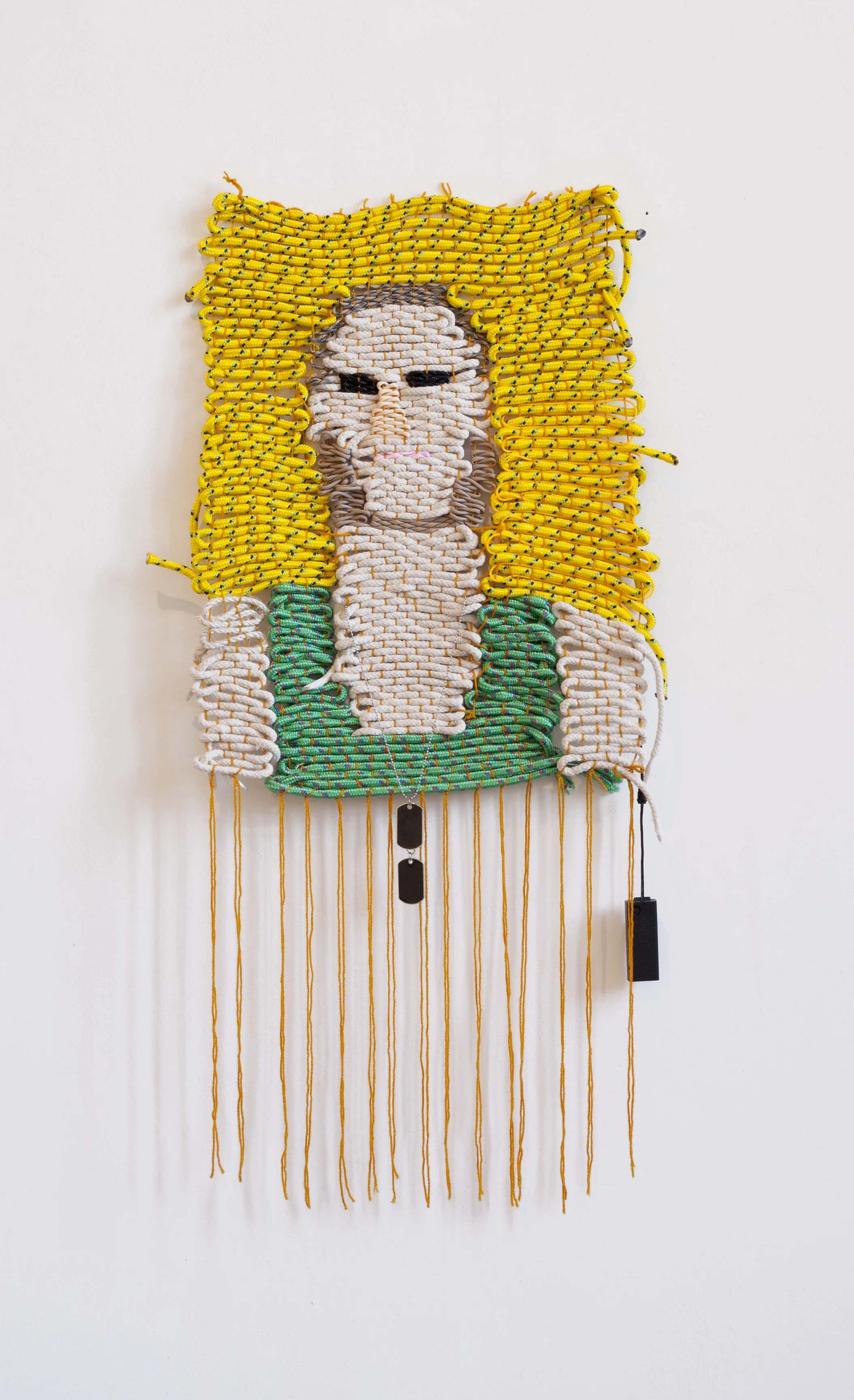 any near ur pussy ?, 2015 Wool, polypropene rope, paracord, cotton sash cord, electroluminescent wire and dog tags. 130 x 50cm Photo by Nathan Brooker. 