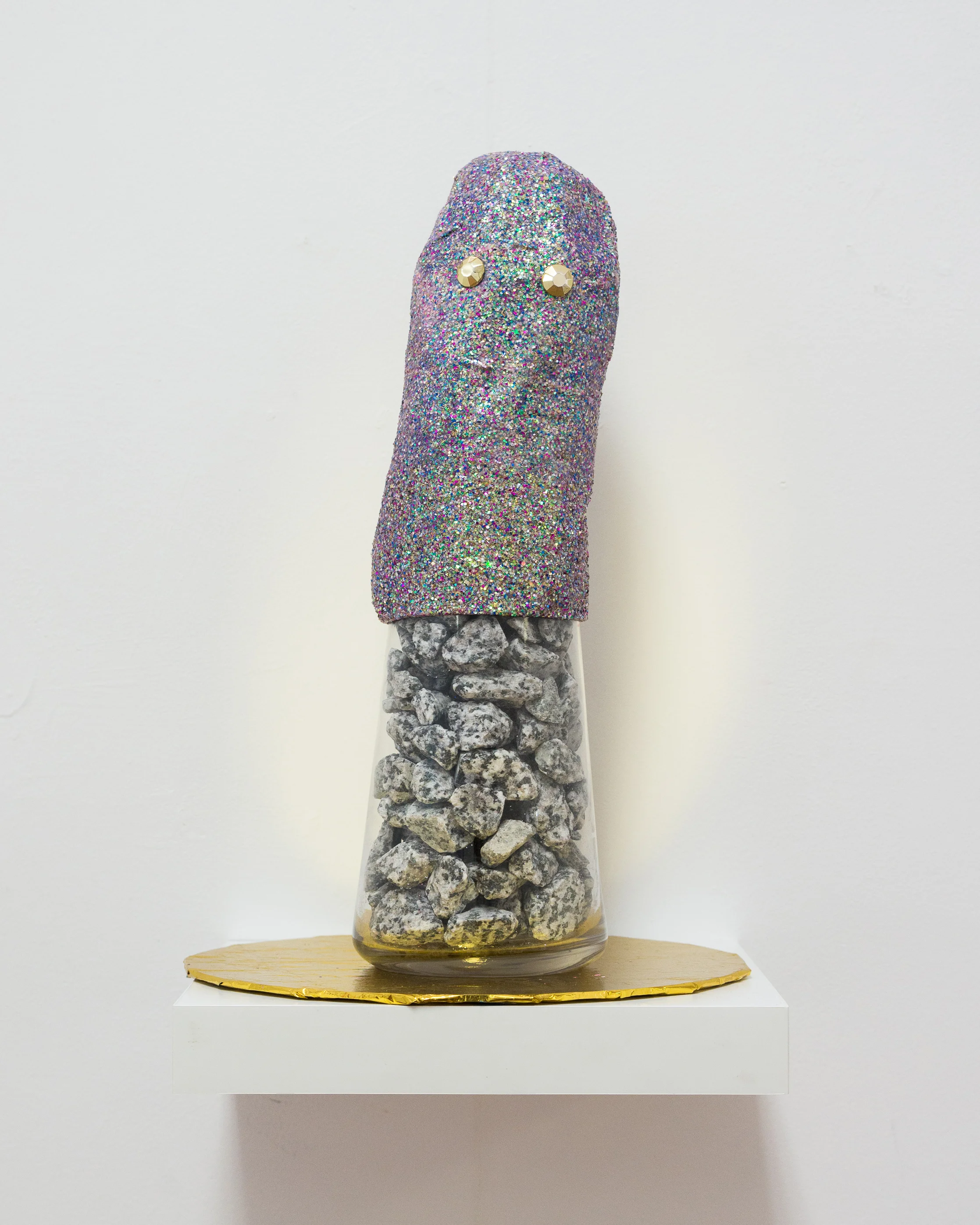 Ryan Glass, granite, paper mache, glitter, plastic gems, MDF, mylar