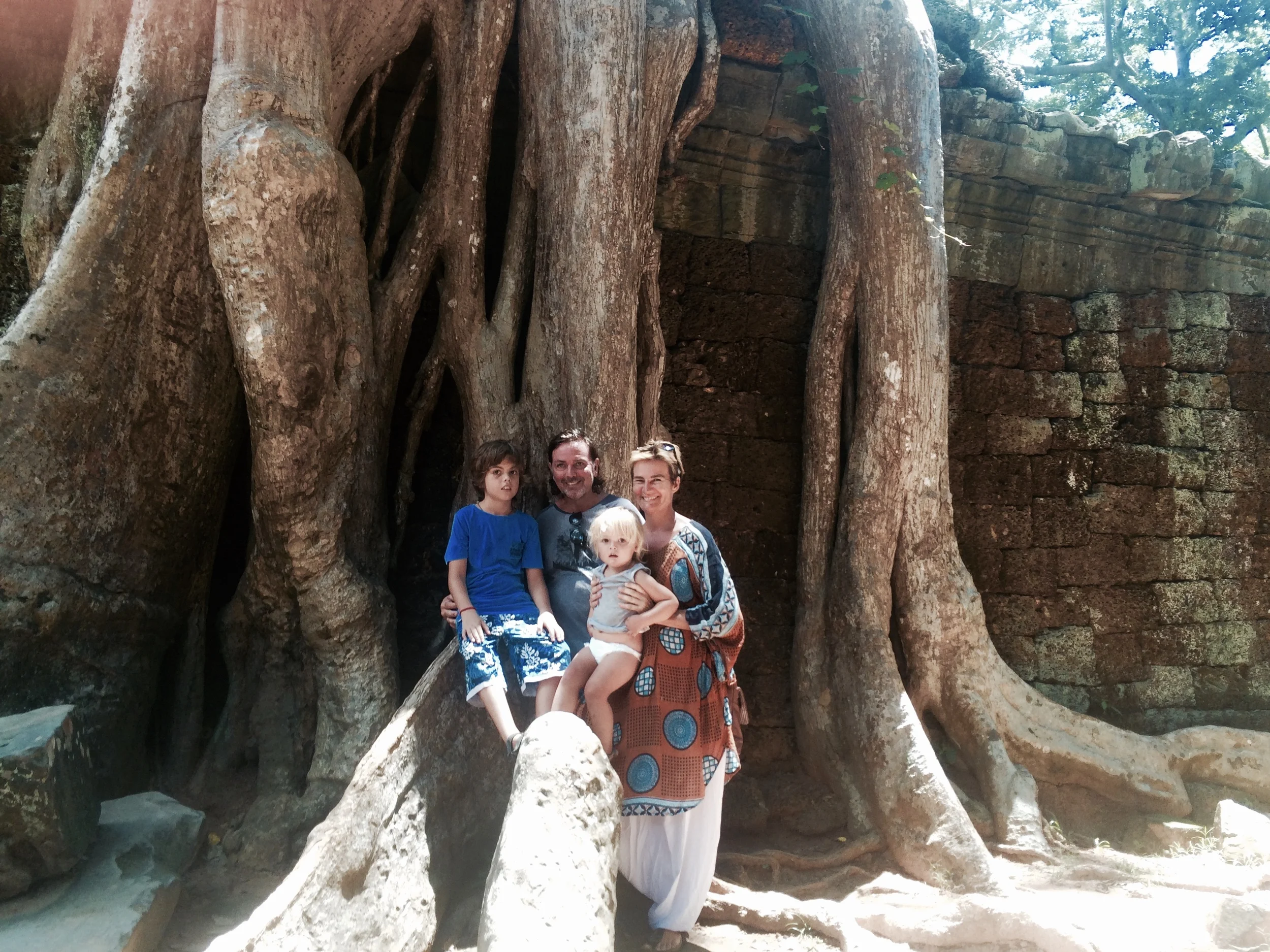this is us on a big tree at another temple. The trees roots grow through the temple. This is where the film Tomb Raider was set. 