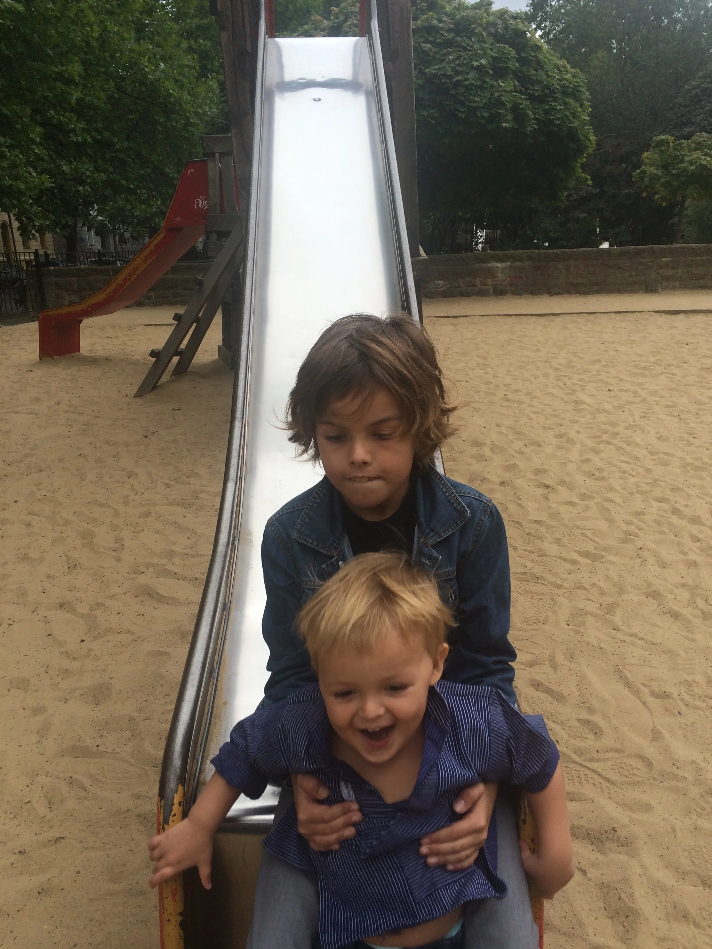 hugo loves going on slides. I some times go with him.