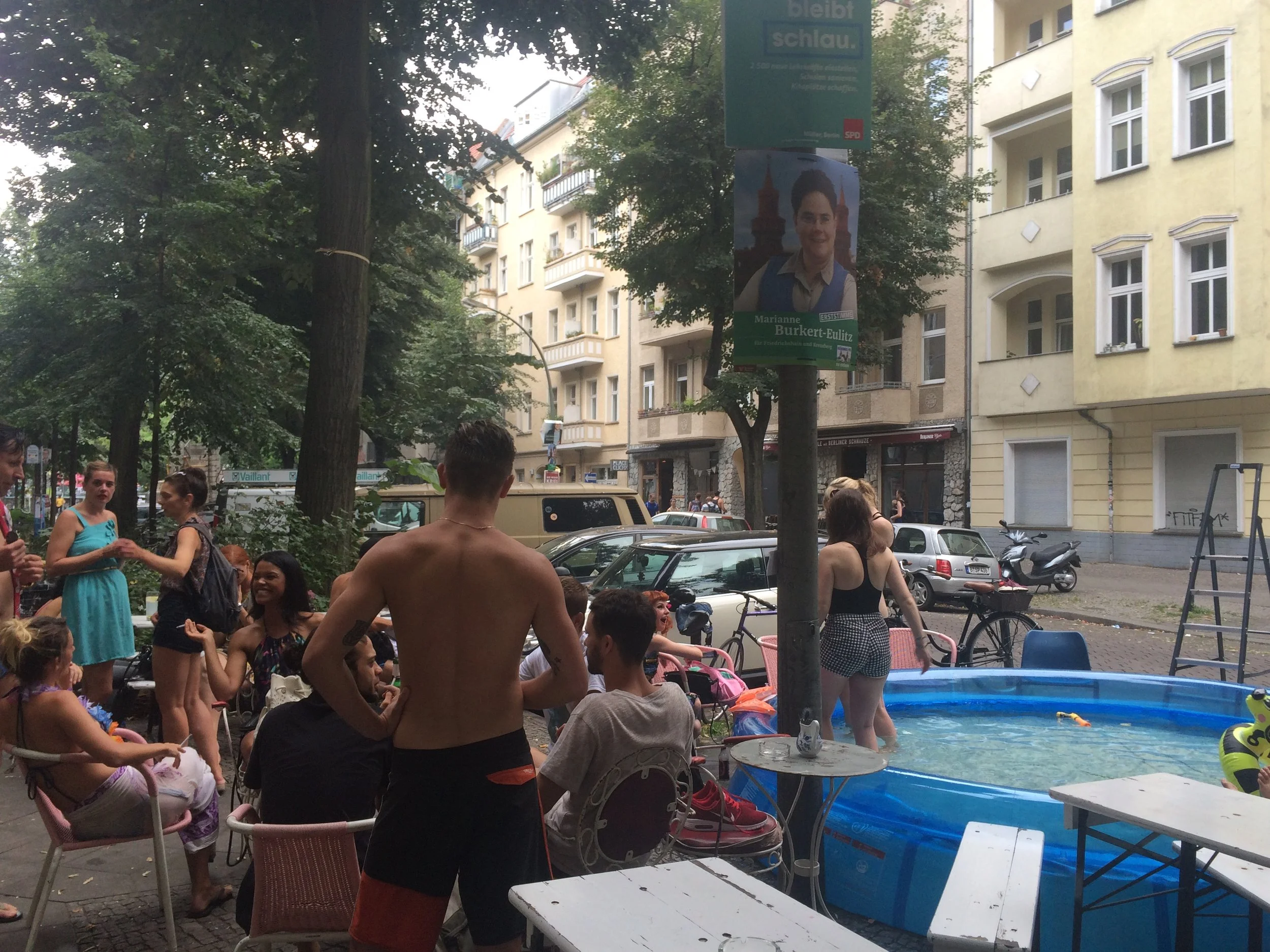 this was like a hawiian party at a restaurant it had a pool and they were like they were at a beach