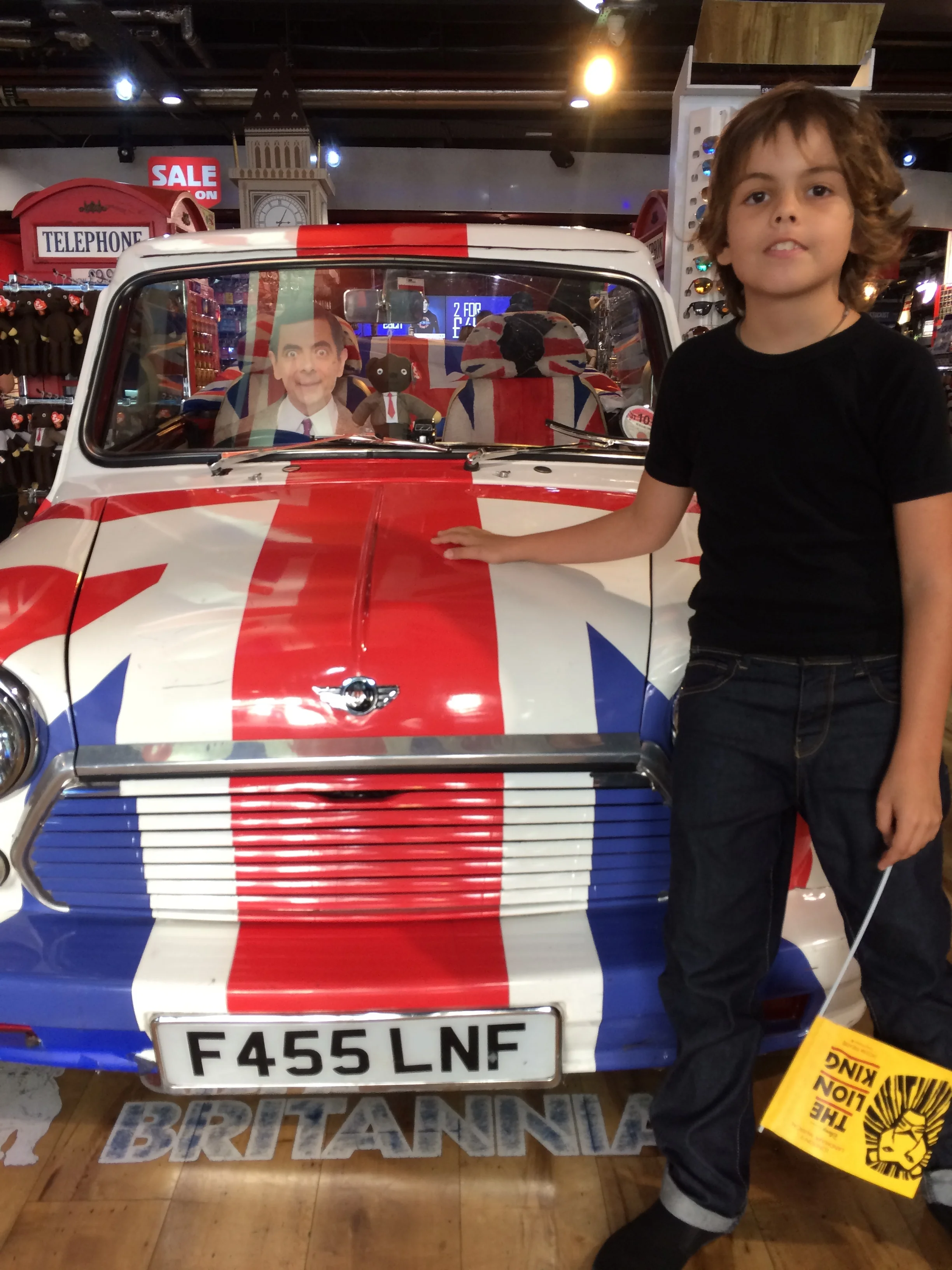 this was in a shop and mr bean was in the car. It was really cool because it had the british flag on it. In this shop there was heaps of english flags.