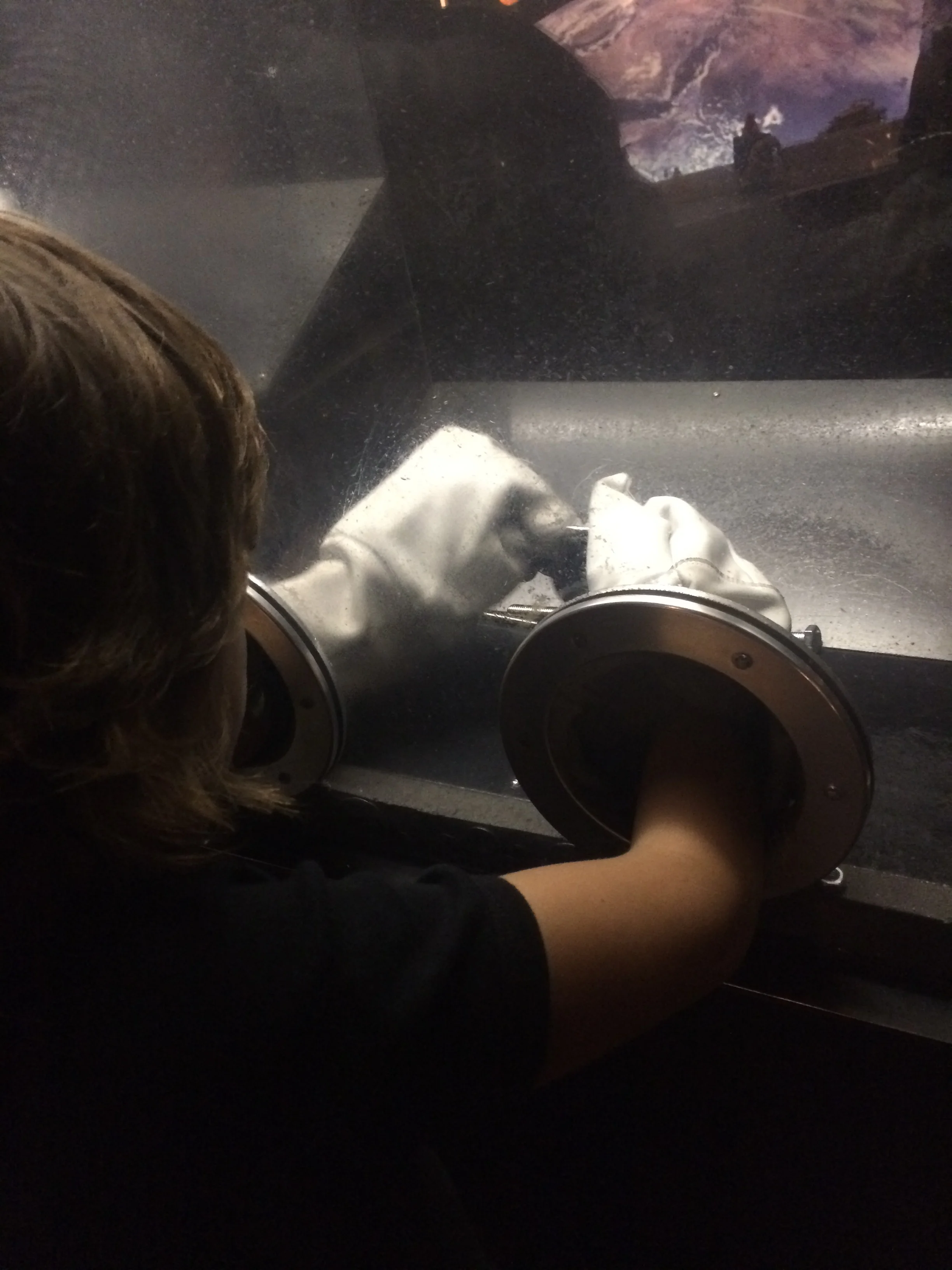 We went to a Science Museum. This is some gloves that would astronauts would wear. In space, austronauts have to do a lot of tricky things and science experiemtns, but they always are in their space suit, except for inside. I had to screw a bolt and a screw together. it was hard. I saw heaps of rockets and also space food. When I saw the rocket I thought it was a missile.