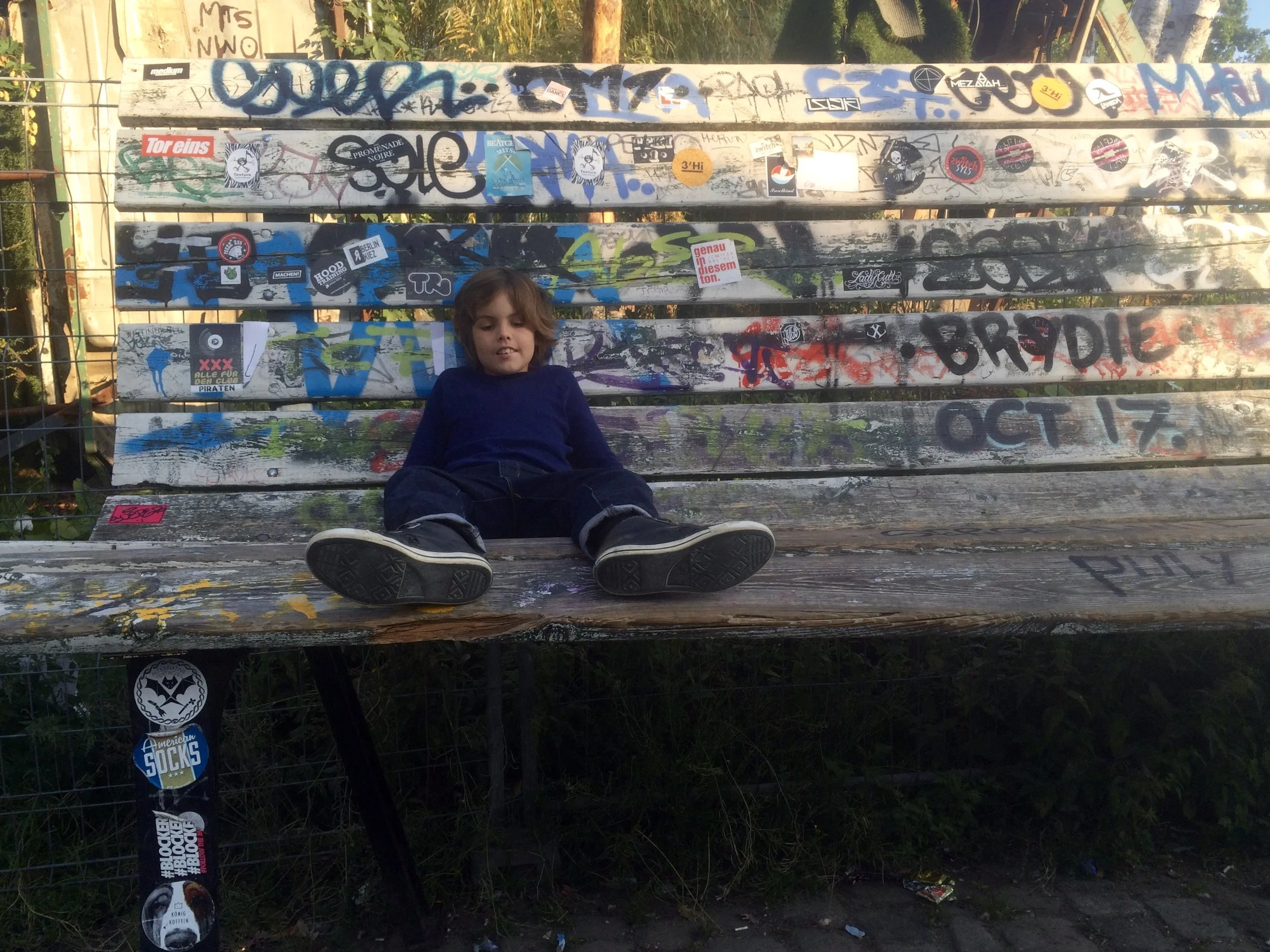 I found this huge chair, so I asked mum to help me on there. We walked for a little bit more, I found heaps of big charis nd another skatepark.