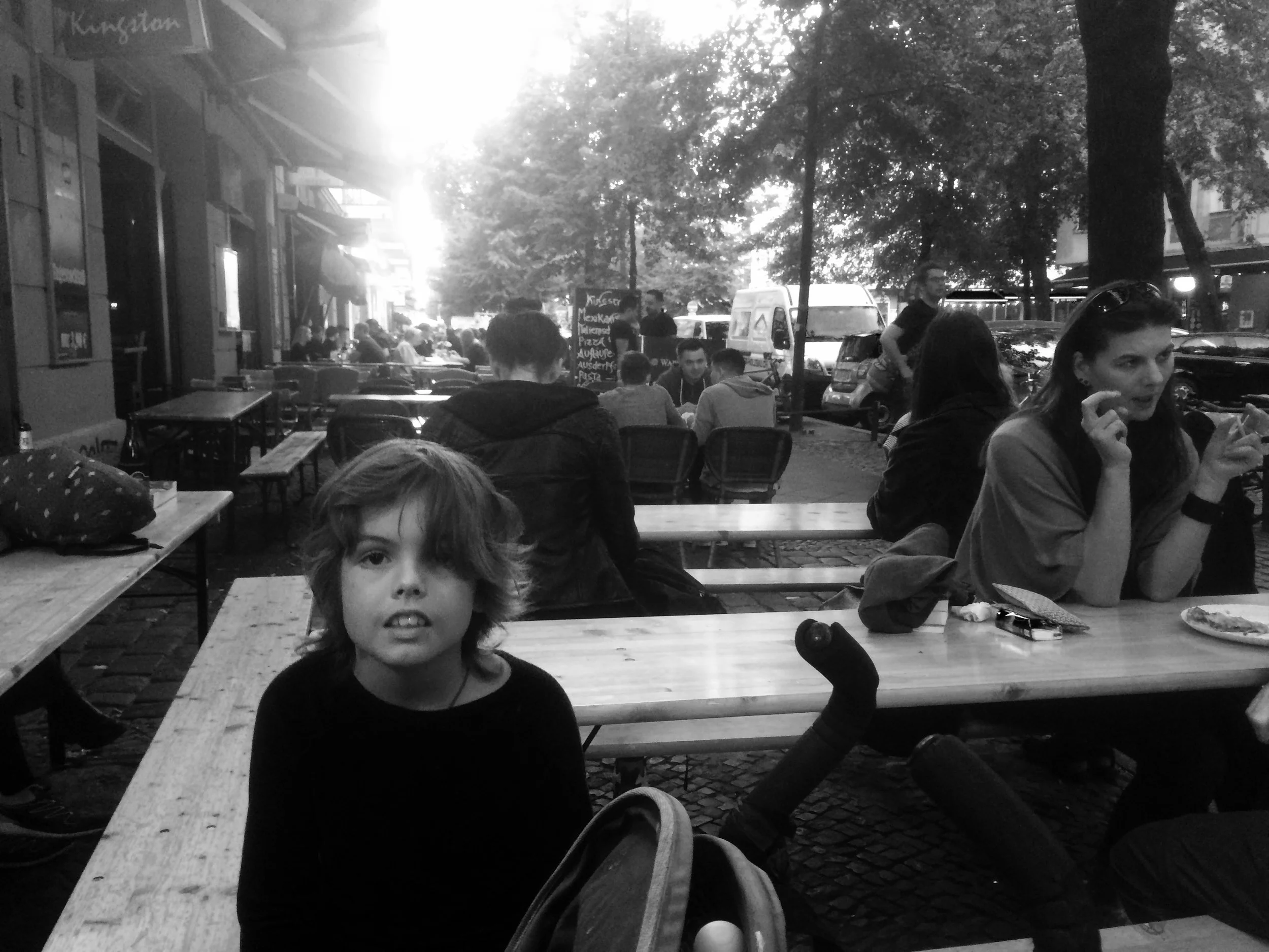 Mum decided we should have some pizza for dinner. This is our street where we live in Berlin. Its always very busy. We usually go to this pizza shop because I think the pizza's are really good. This is way different to Wonga Beach because there are no shops, and here there are so many of them just a few seconds away here. 