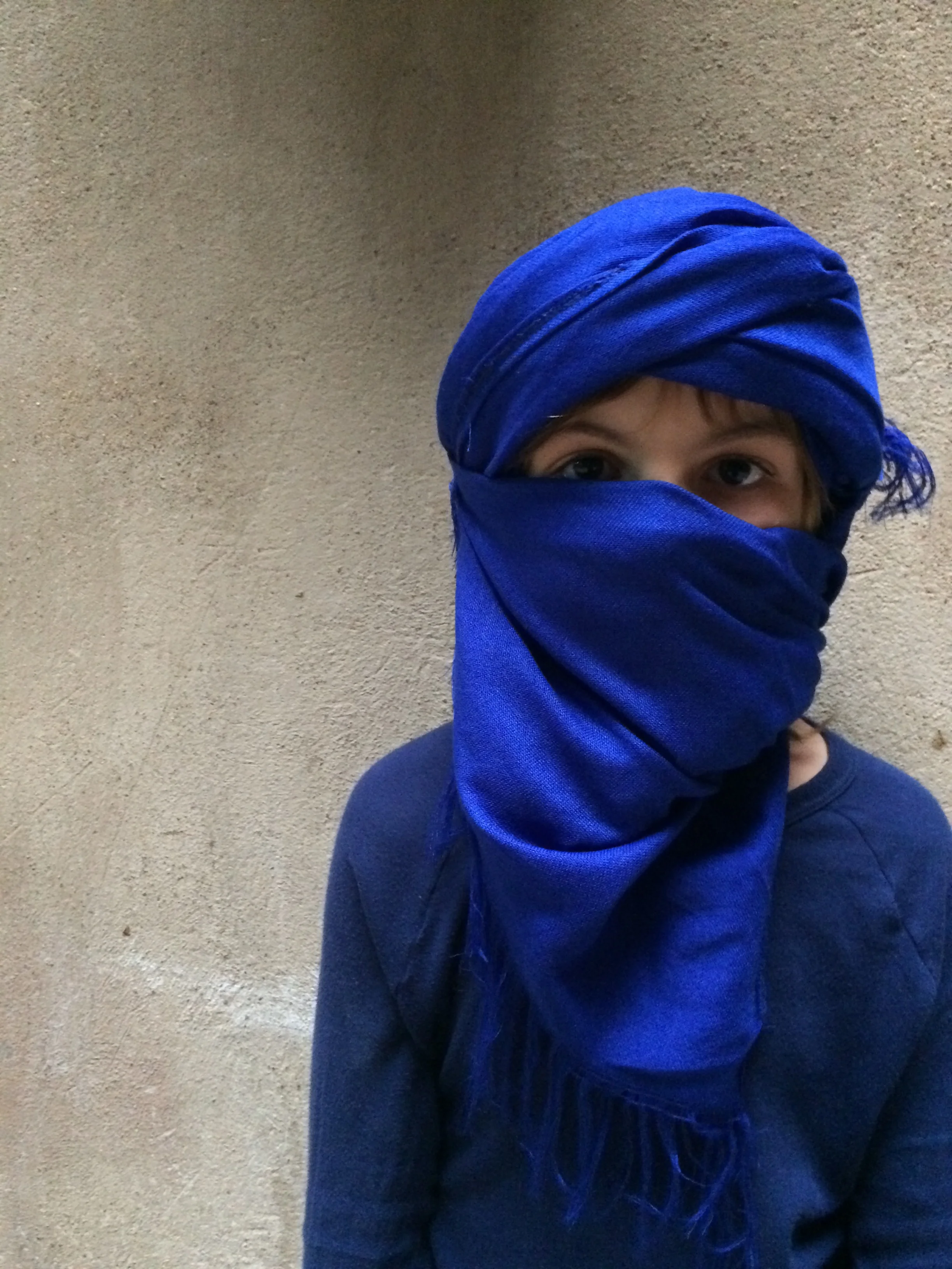 i was taught how to make this mask like a Berber. mum and me bought a scarf - we saw how cotton was made which looked fascinating but weird.