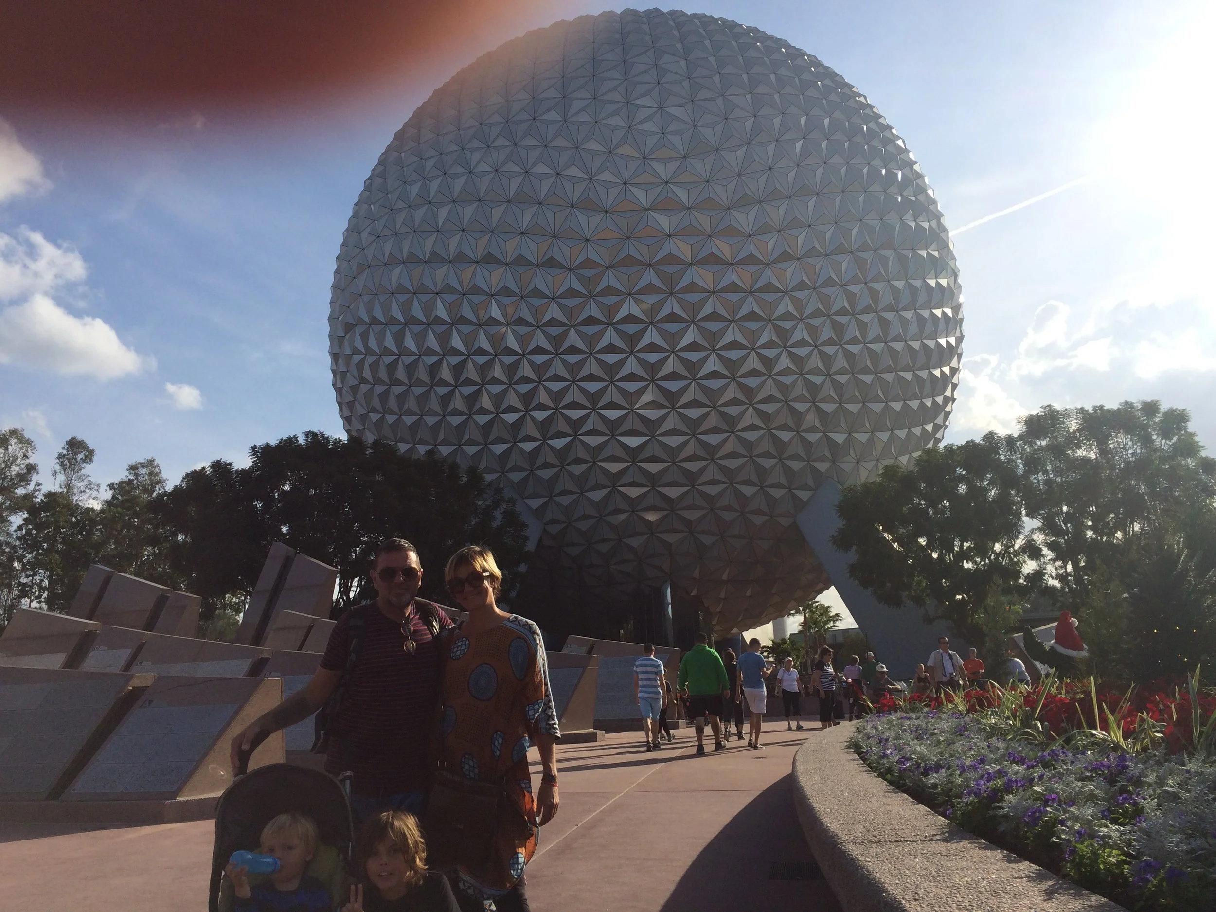 Yesterday we went to the Epcot because we didn't do most of the rides i liked test track the most because you make a car and see how good the car does i thought that was amazing + it was a roller coaster and i thought that is was amazing. There was another great ride called mission space and you hopped into a captule like your in a rocket ship, and you have to be the commender, engineer, pilot or navigator, and you feel Gforce as you spin through the planets. You go to Mars. it was amazing and epic. In the ball behind us is a ride called space, and its a time machine. You start off at the start of civilisation and track communication - you get to build your own future.