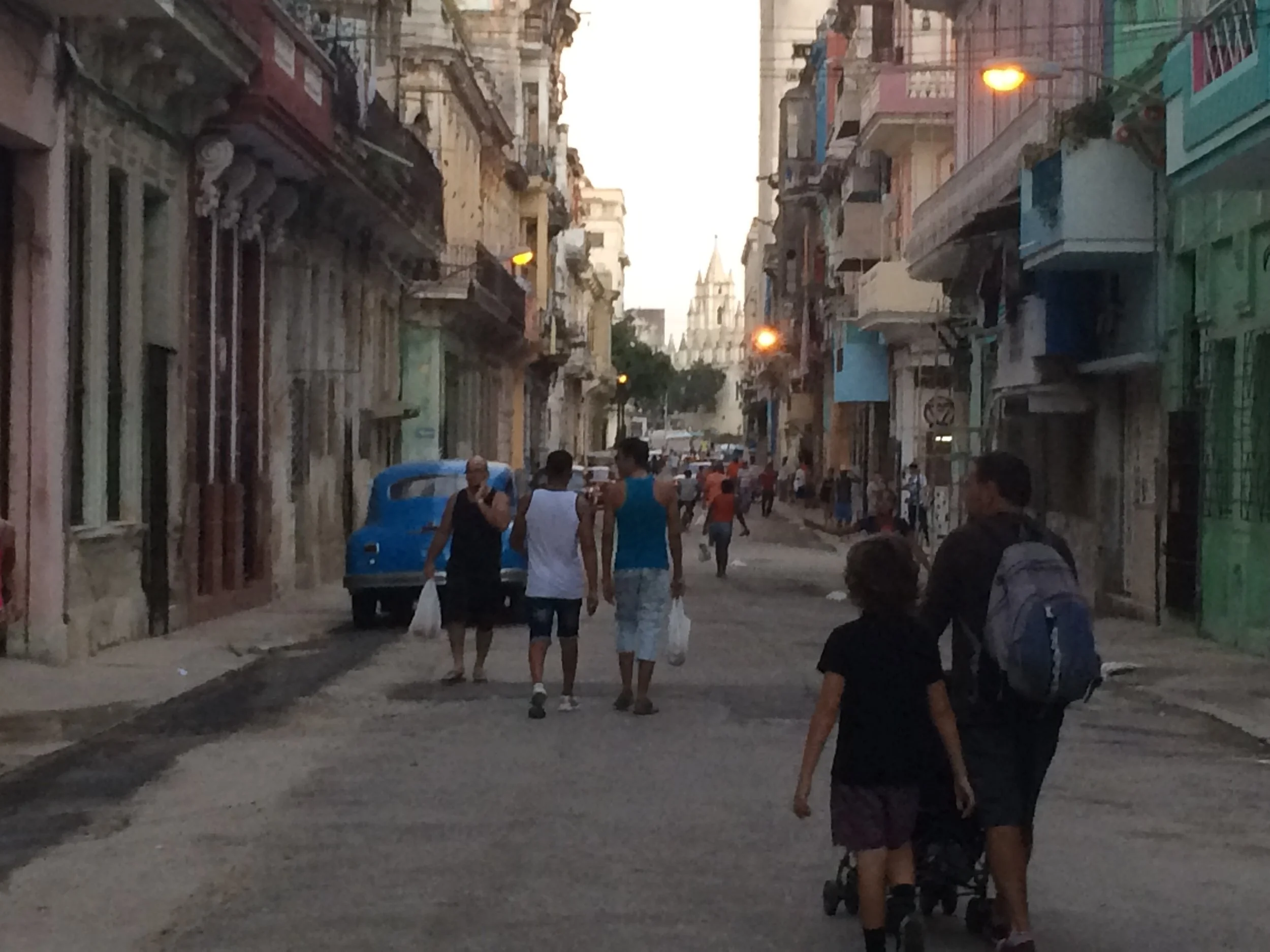 The streets in Havana are filled with people. Everyone plays on the street. they talk all the time. They like to sing and dance. They speak Spanish and the Spanish word for hello is hola plus the word thank you is gracias. It is pretty hot here. There are not many cars on the street as few people can afford to own a car. There are few shops here - its hard to buy anything. The people are given beans and rice to eat, and vegetables, and a small amount of meat by the government. There is no signage selling anything. 