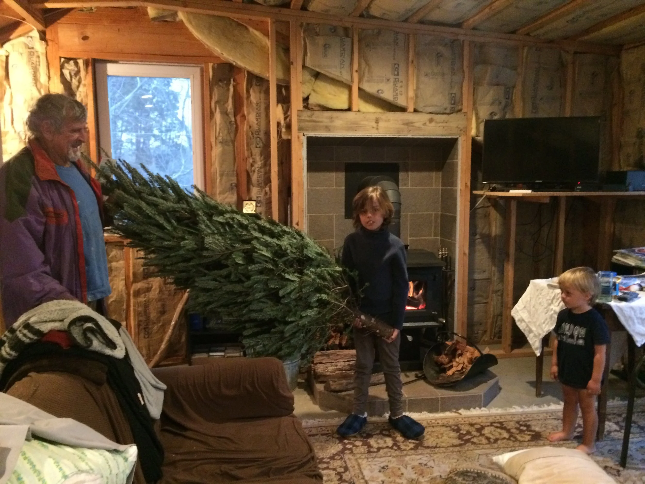 we went to Ree's and grandpa's for christmas which was awesome . i love christmas it is the best time of the year for me because you get presents and hang out with your family .the christmas tree was a real life tree. This is the first time I have had a real life tree. We picked it up on the way back from the airport!