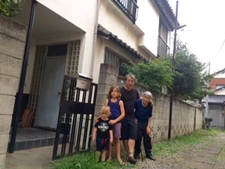 This is hiroshi's house. I reckon it looks very huge. It has an upstairs and downstairs and its so wide. I slept upstairs with mum and hugo. 