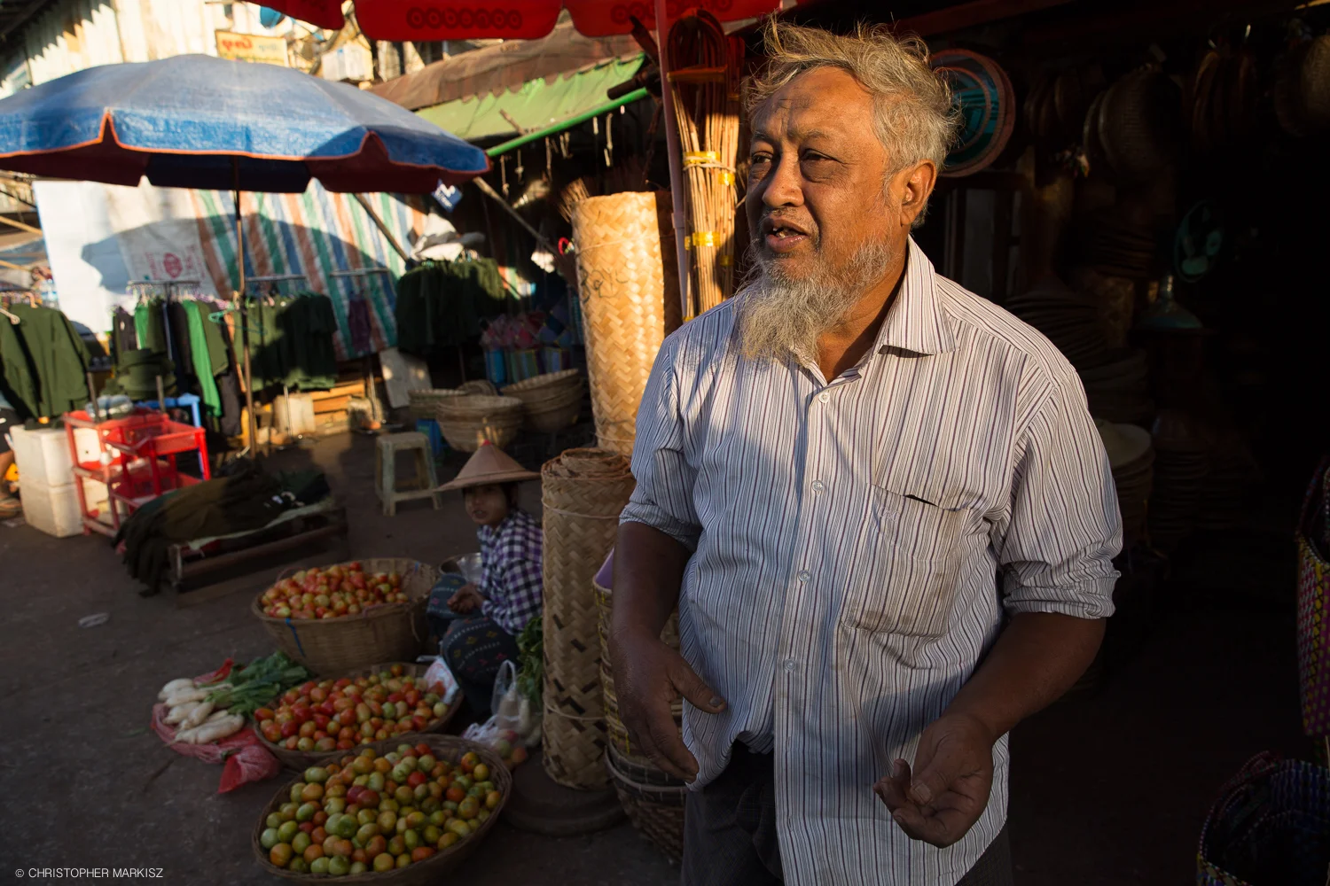 Outside his shop at a local market in Mawlamyine, Myanmar, this man was happy to have his photograph taken after initiating brief conversation with me on world politics, which can be a touchy subject in Myanmar.