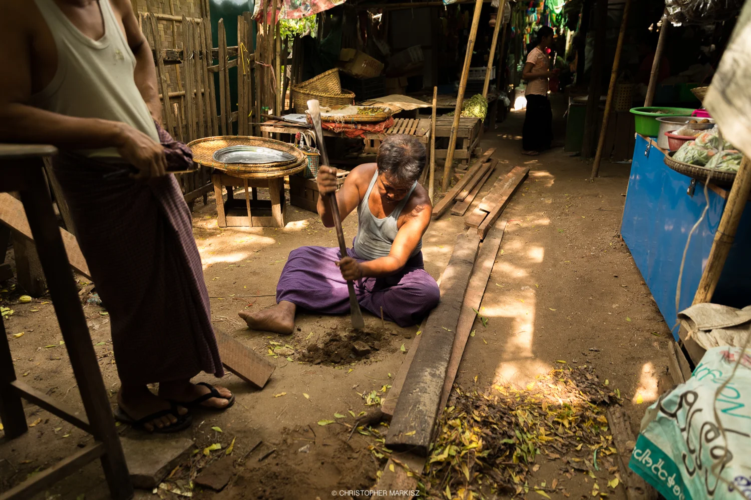 A man begins to build a stall at Nyaung-U market in Myanmar.