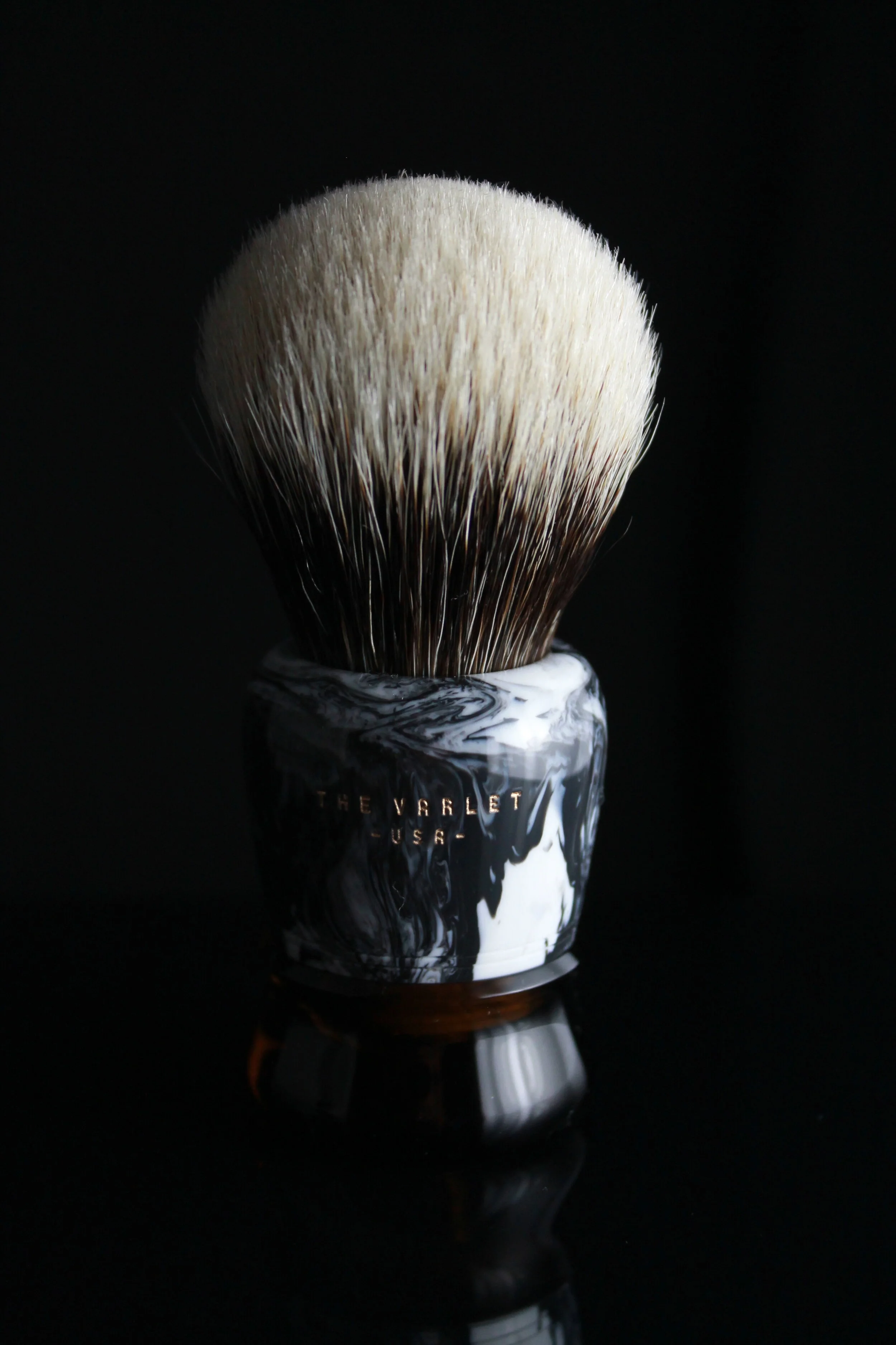  BLK / WHT marble top with Amber Smoke (not currently avail.) bottom in high polish with gold enamel engraving. 