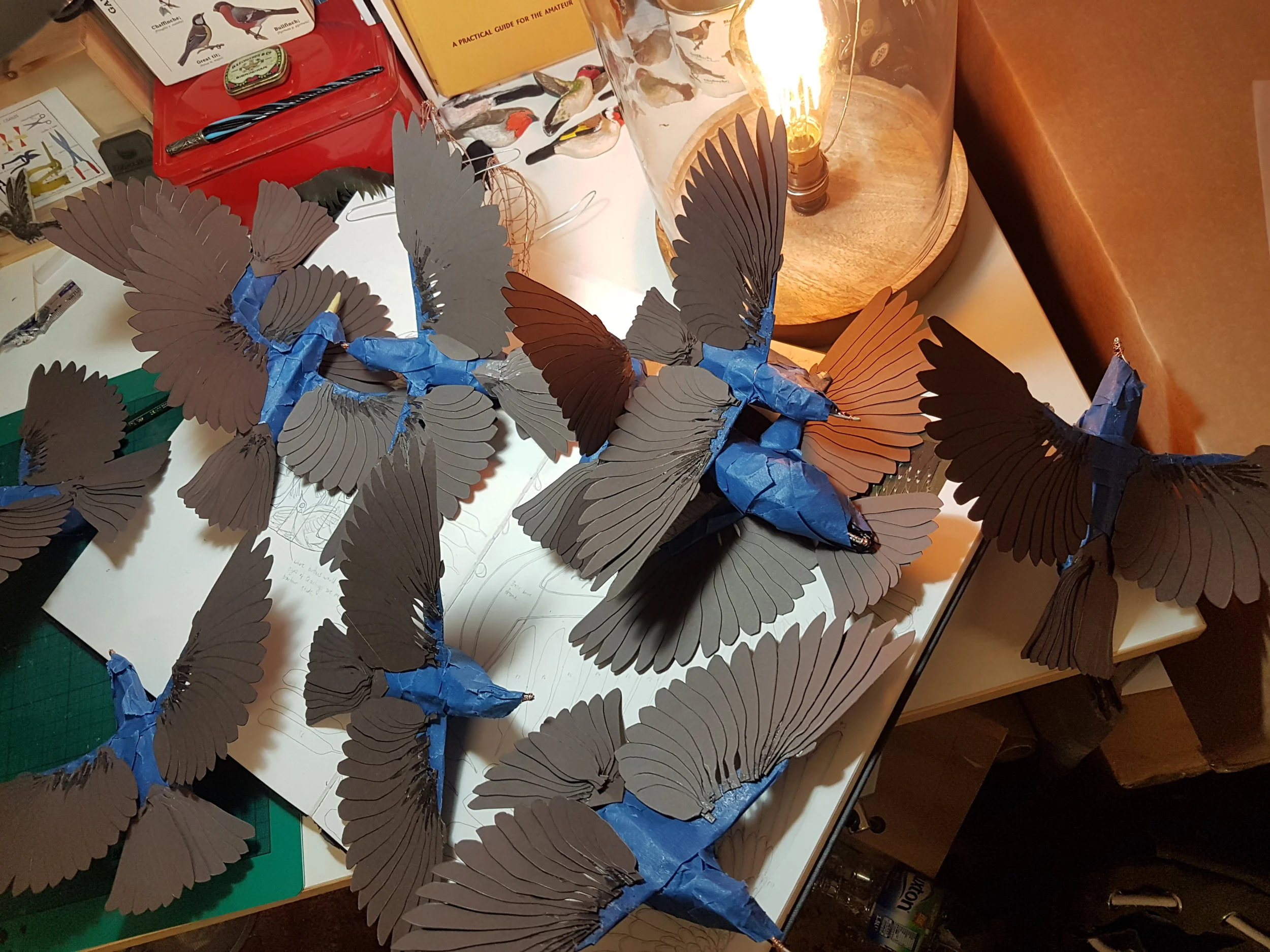 After all of this work was done the next step was to integrate all of the lightweight wax materials from Barbour. These were easy to cut and fun to play with, created in layers of feather shapes glued on top of each other working from the tail to the head. Under the wings was where Zack used the soft corduroy material for a nice contrast when displayed.
