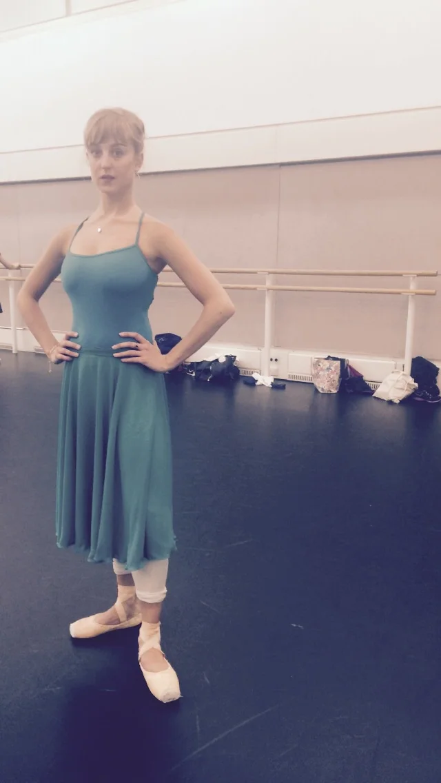 Camille in sea greens.