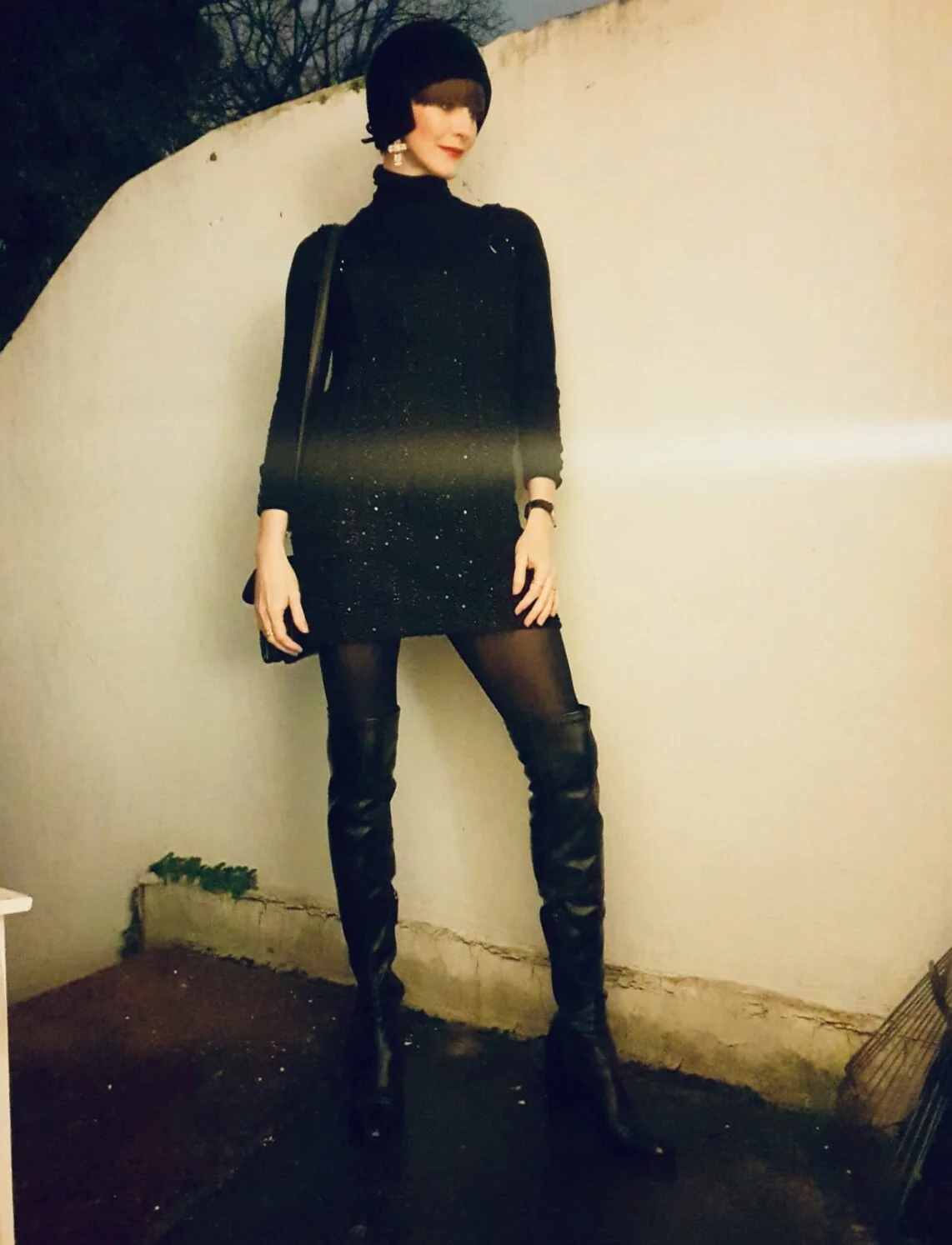 Wearing my sparkly pinafore dress with poloneck and knee high boots. Got this hat from a vintage shop in Valencia.