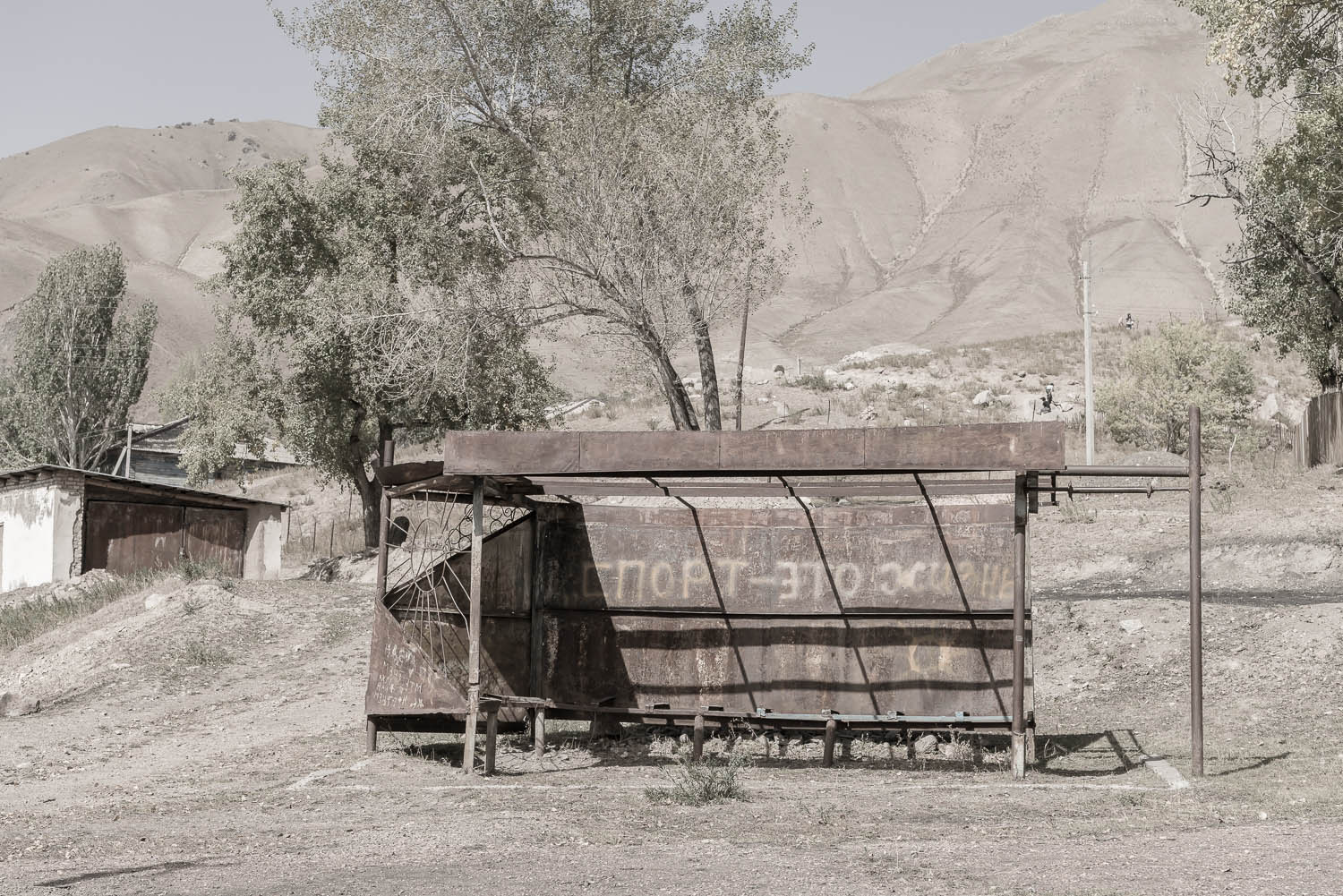 jo-Kearney-videojournalist-photographer-cheltenham-minkush-min-kush-Soviet-Union-bus-stop-rusting-industrialwasteland-uranium-mining-ruins-environment-hazardous-waste.jpg