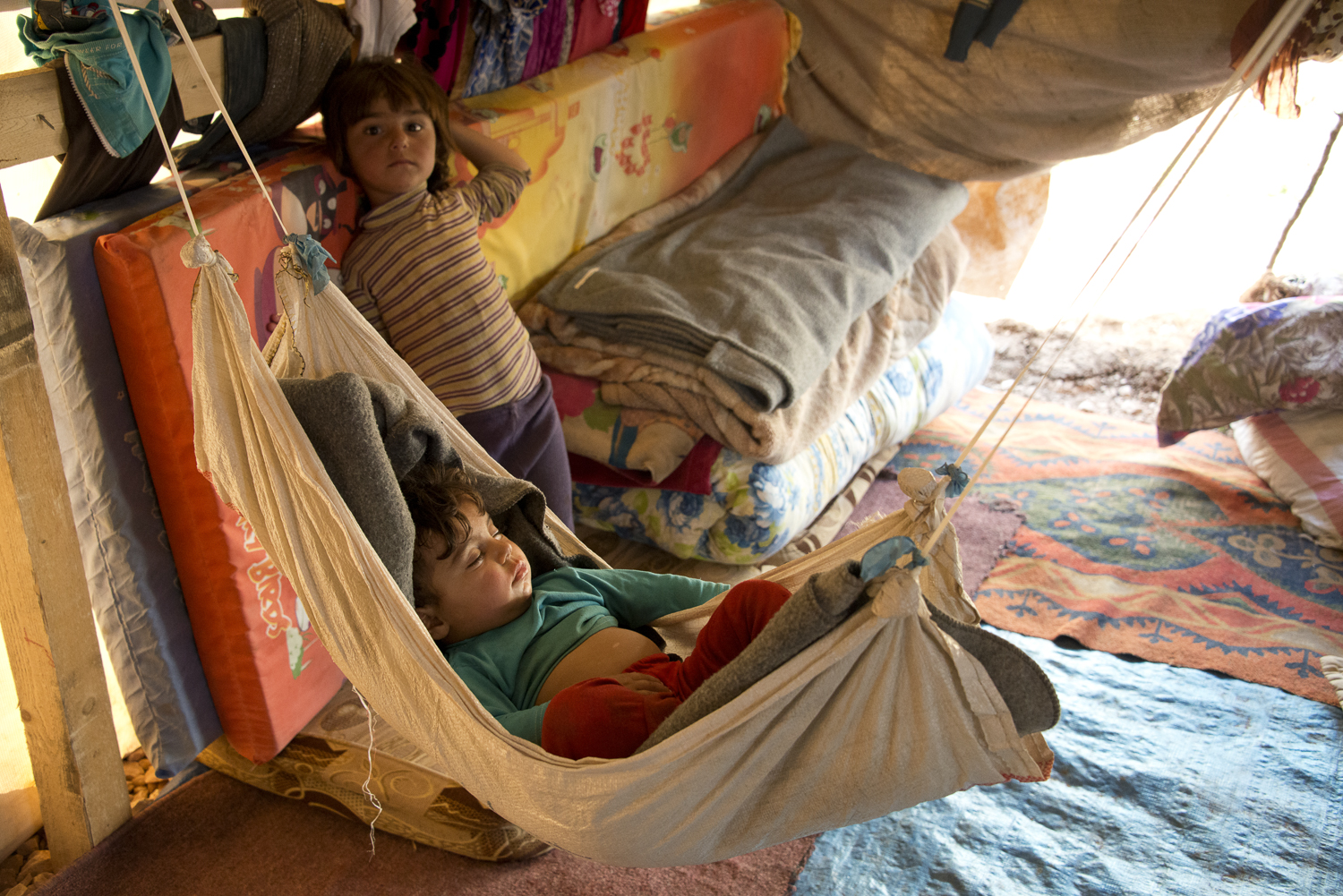 jo-kearney-photography-video-refugees-lebanon-bekaa-valley-syrian-refugees-baby-hammock-tent.jpg