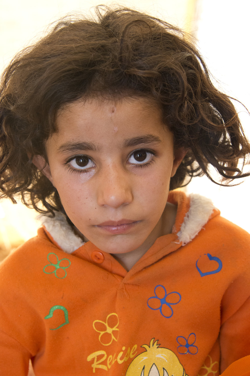 jo-kearney-photography-video-refugees-lebanon-bekaa-valley-syrian-refugees-girl.jpg