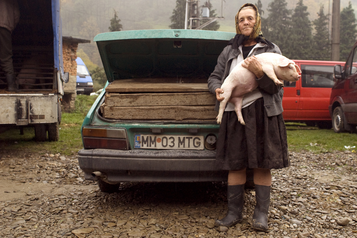 portrait-photography-portraits-life-coaching-business-portraits-jo-kearney-photography-video-cattle-market-Romania-Maramures-pig-seller.jpg