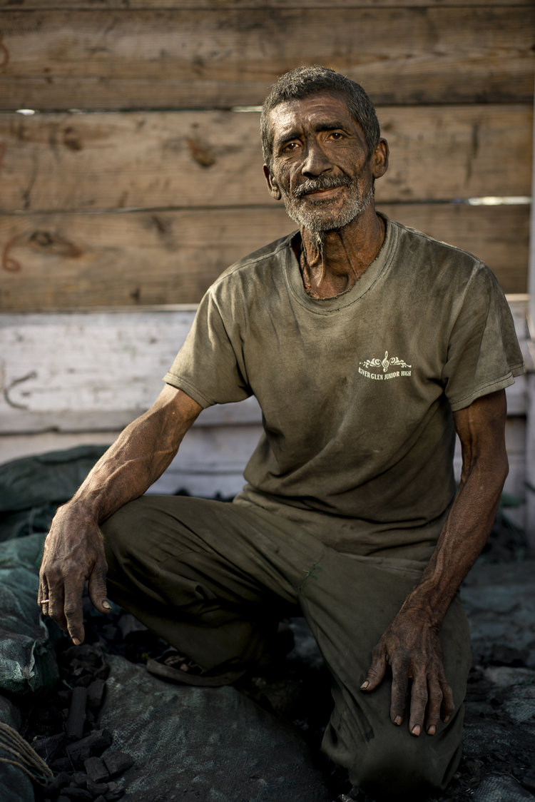 portraits-charcoal-workers-uae-jo-kearney-photography-video-travel-photography-migrants-migrant-workers-dhows.jpg