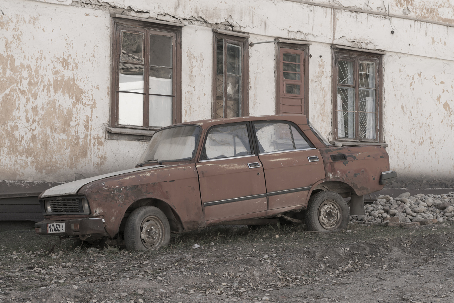 min-kush-soviet-uranium-mining-town-industrial-Russia-Kyrgyzstan-ruins-soviet-sign-jo-kearney-photos-video-photography.lada.abandonment.jpg