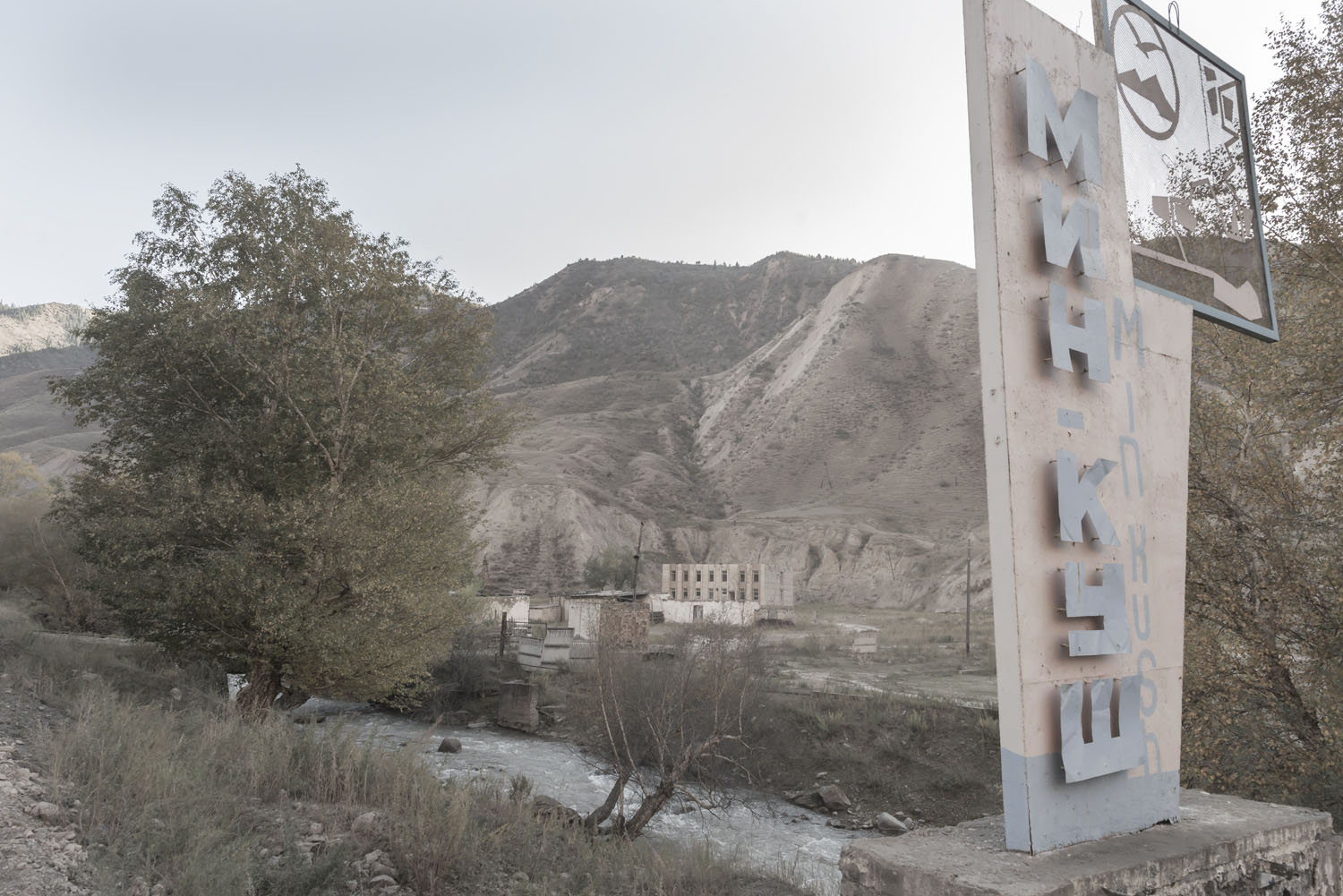 min-kush-soviet-uranium-mining-town-industrial-Russia-Kyrgyzstan-ruins-soviet-sign-jo-kearney-photos-video-photography.jpg