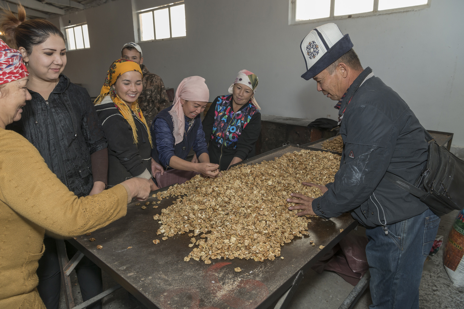 walnuts-picking-kyrgyzstan-child-arslanbob-soviet-union-market-selling-walnuts.jpg