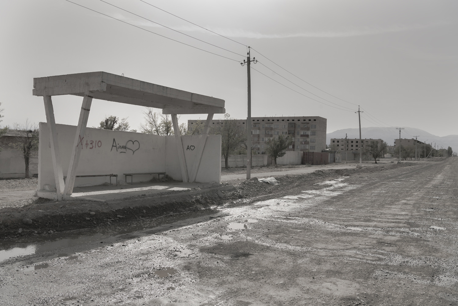 bus-stop-abandoned-boats-port-industrial-city-Soviet-Kyrgyzstan-abandoned-factories-jo-kearney-soviet-kyrgyzstan.jpg