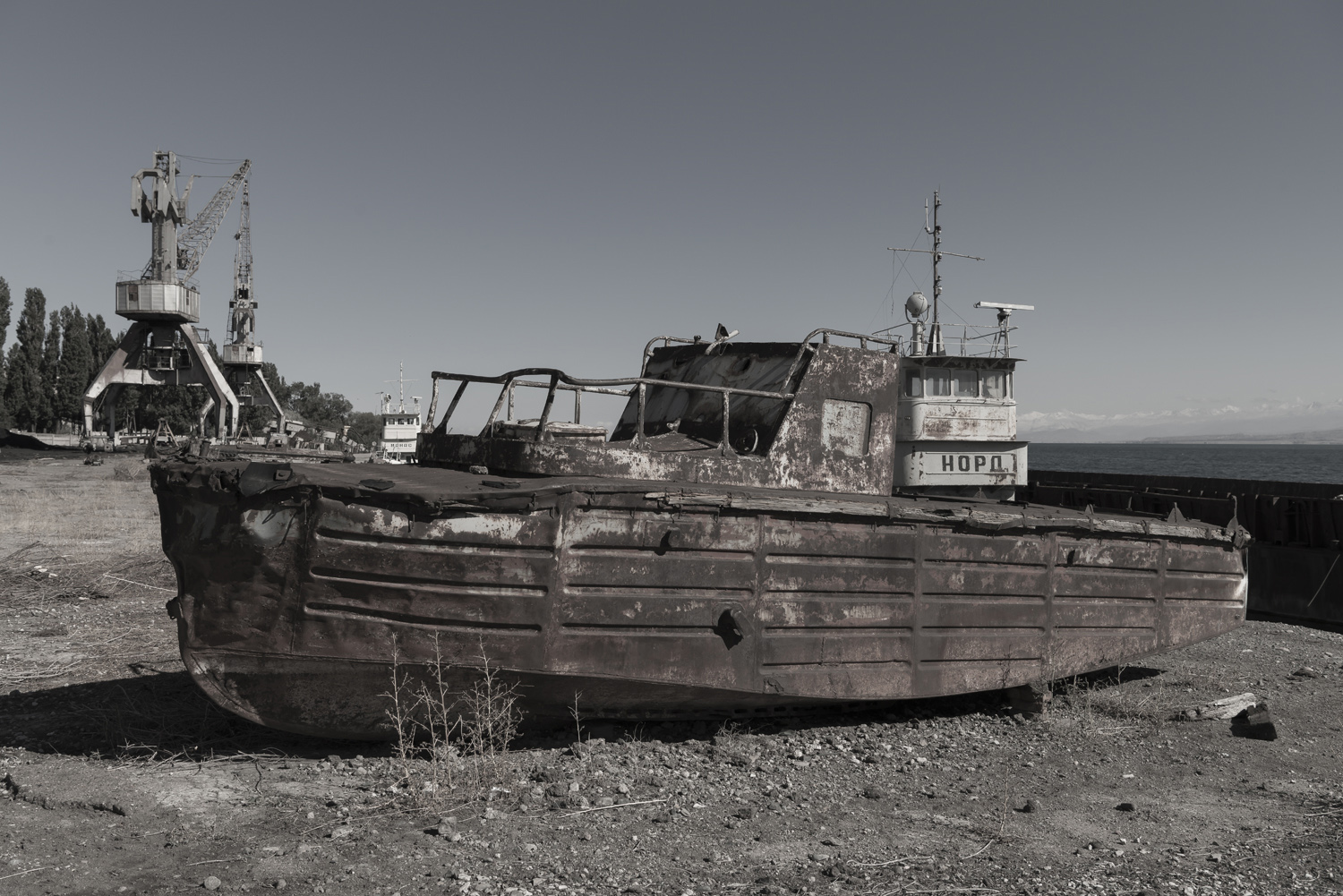 3-abandoned-boats-port-industrial-citySoviet-Kyrgyzstan-abandoned-factories-jo-kearney-soviet-kyrgyzstan.jpg