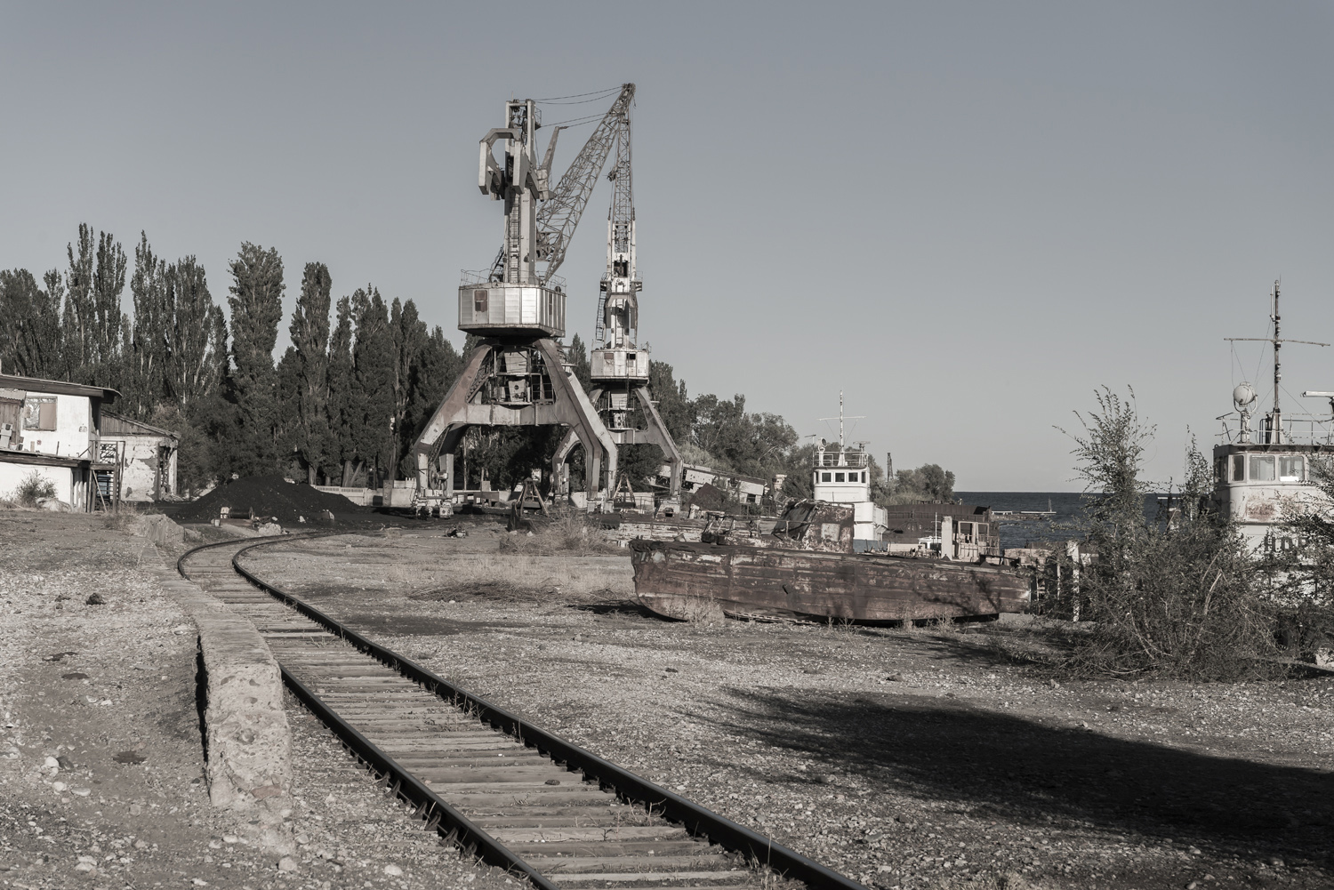 abandoned-boats-port-industrial-citySoviet-Kyrgyzstan-abandoned-factories-jo-kearney-soviet-kyrgyzstan.jpg