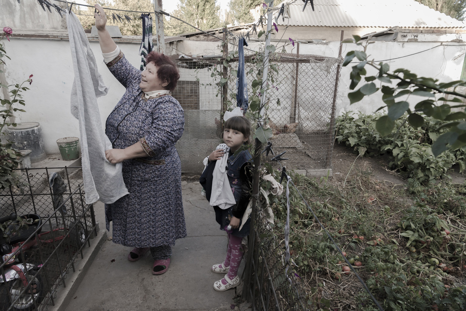 Soviet-Kyrgyzstan-home-elderly-jo-kearney-photography-video-grandparents-caring-soviet-kyrgyzstan-hanging-washing.jpg