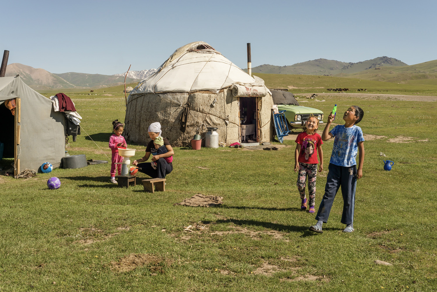 kyrgyzstan-nomads-lake-song-kul-jo-kearney-video-photography-soviet-yurt-family-camping-children-playing.jpg