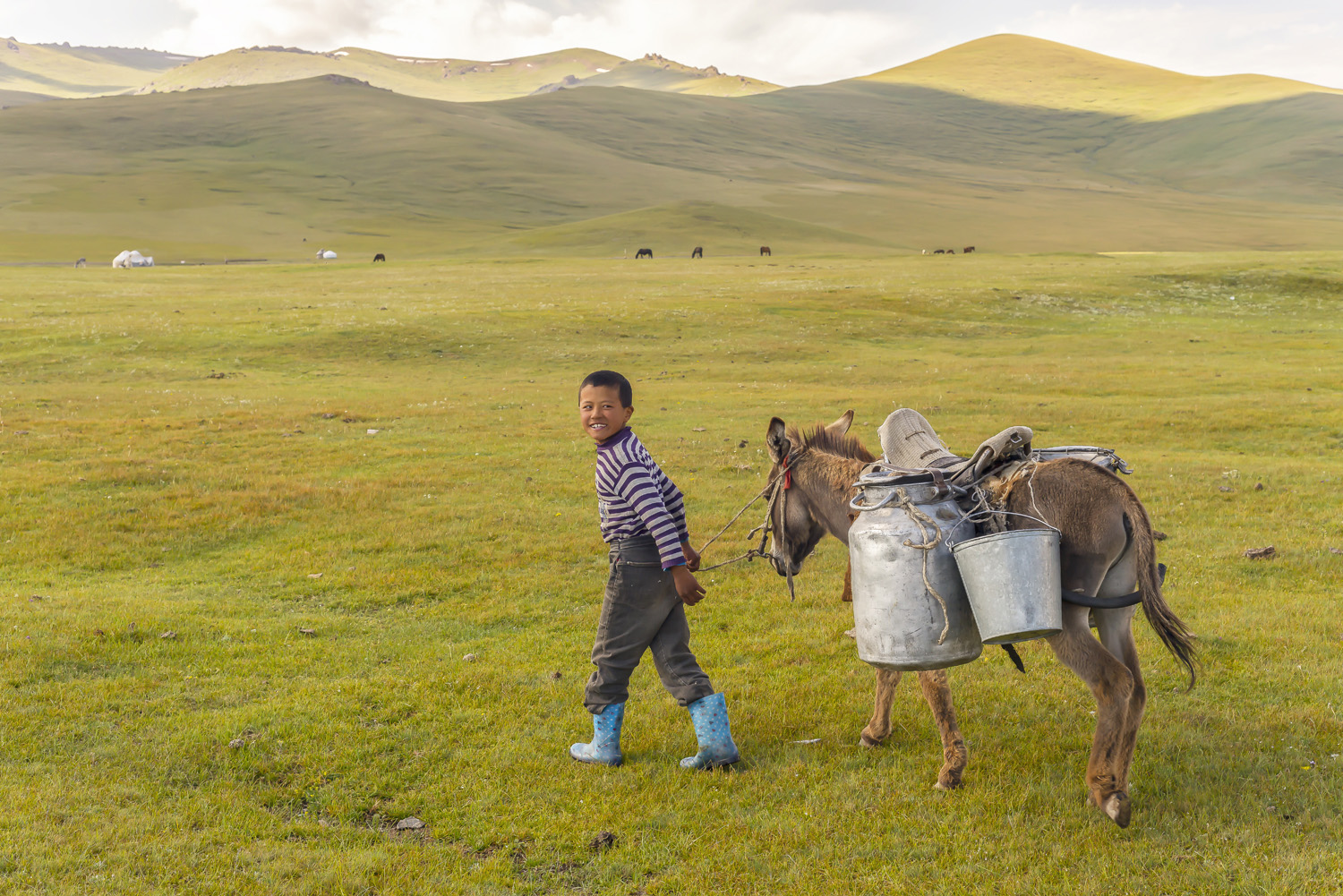 kyrgyzstan-nomads-lake-song-kul-jo-kearney-video-photography-soviet-yurt-family-boy-with-donkey.jpg