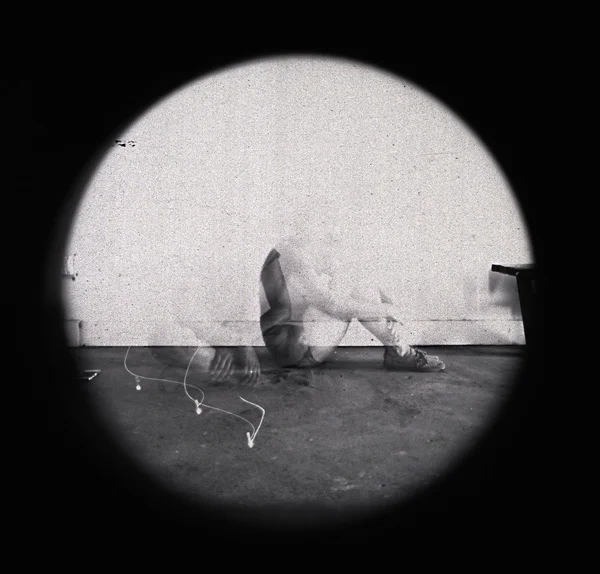 This was the first attempt at the self-portrait above. The camera fell down mid-exposure, so I decided to just change positions. But it turned out to be my favorite image. There are a lot of accidents with this kind of photography, but some of them are happy accidents.